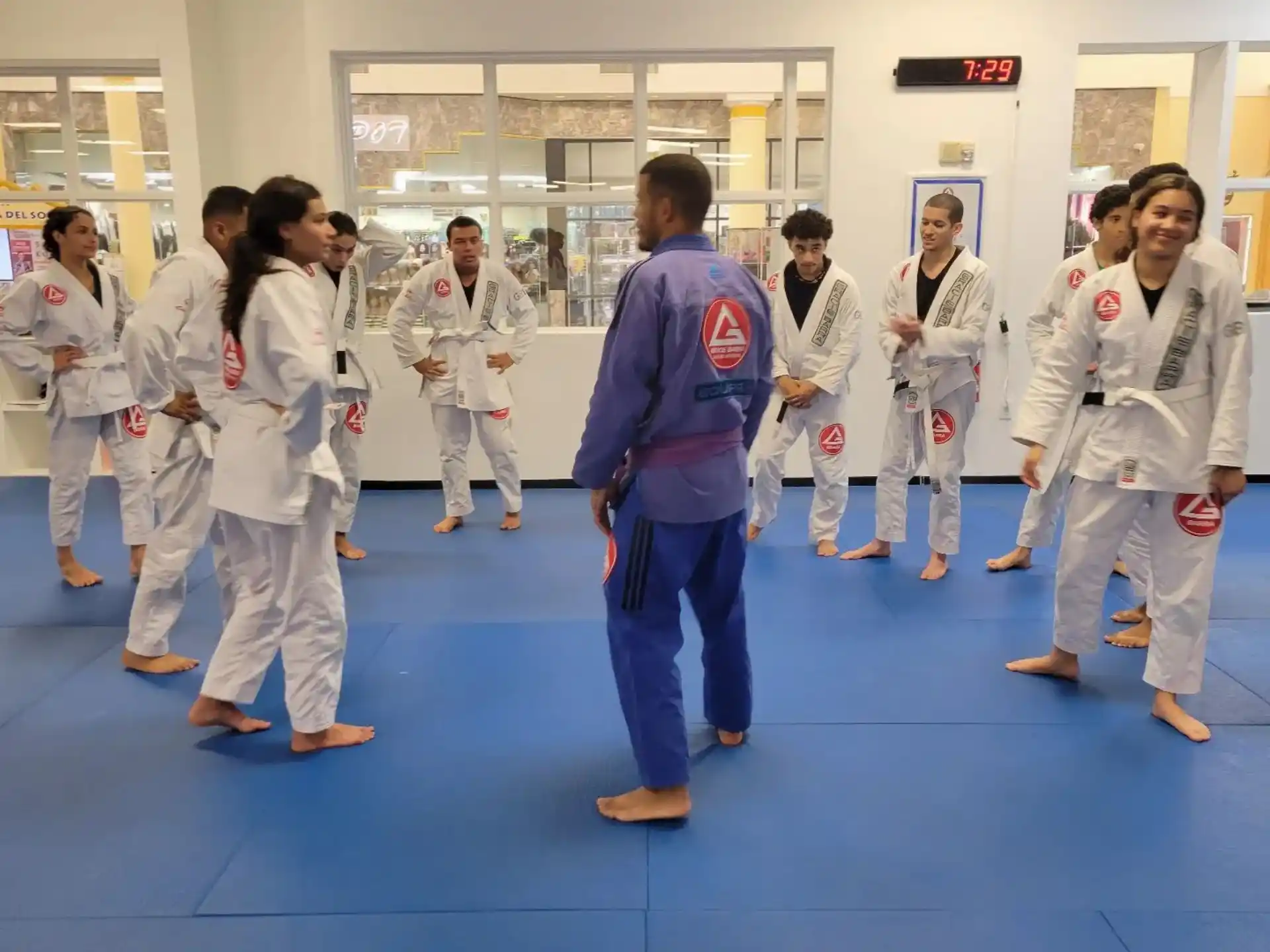 a group of people in karate uniforms