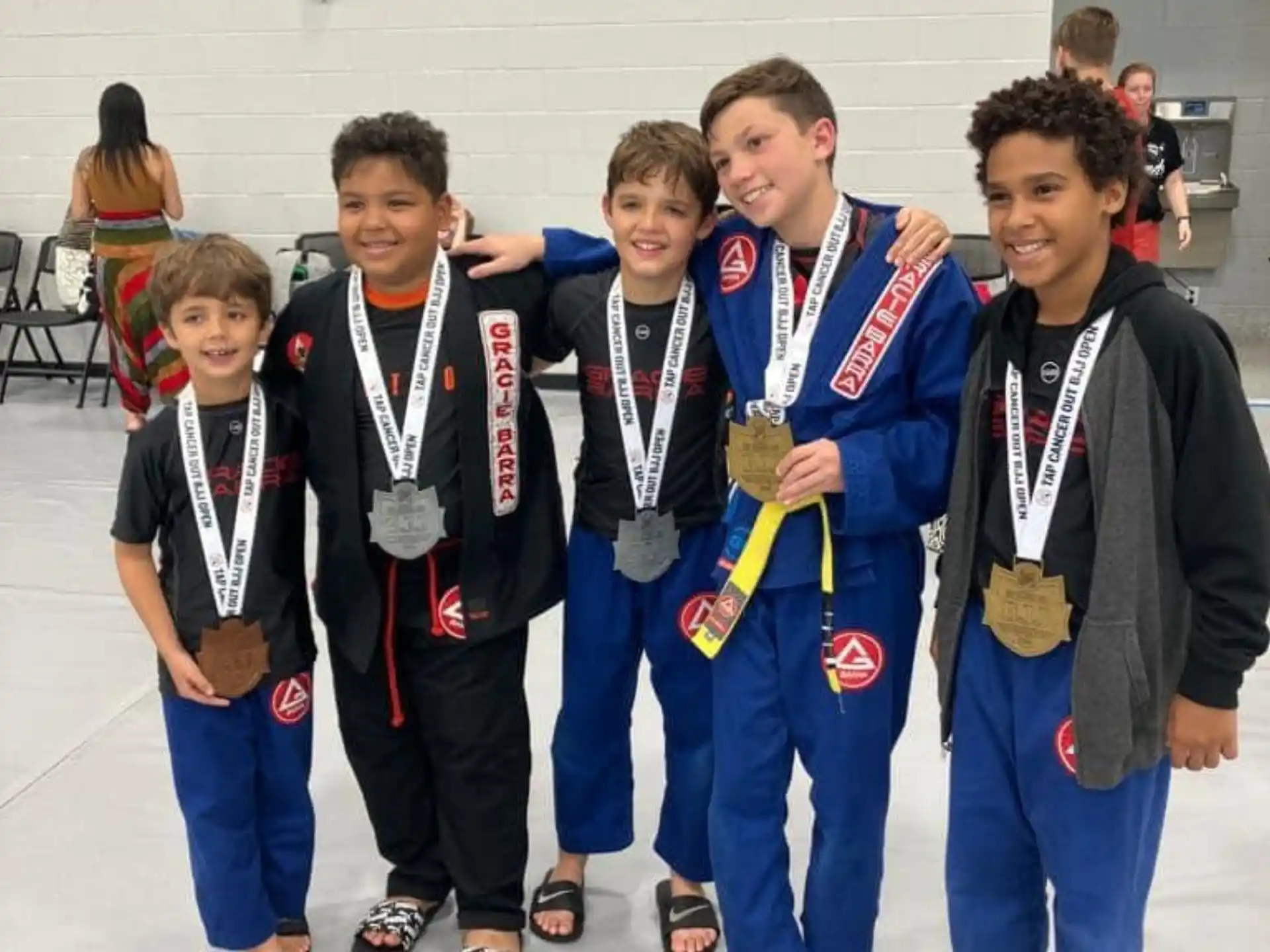 a group of boys posing for a picture