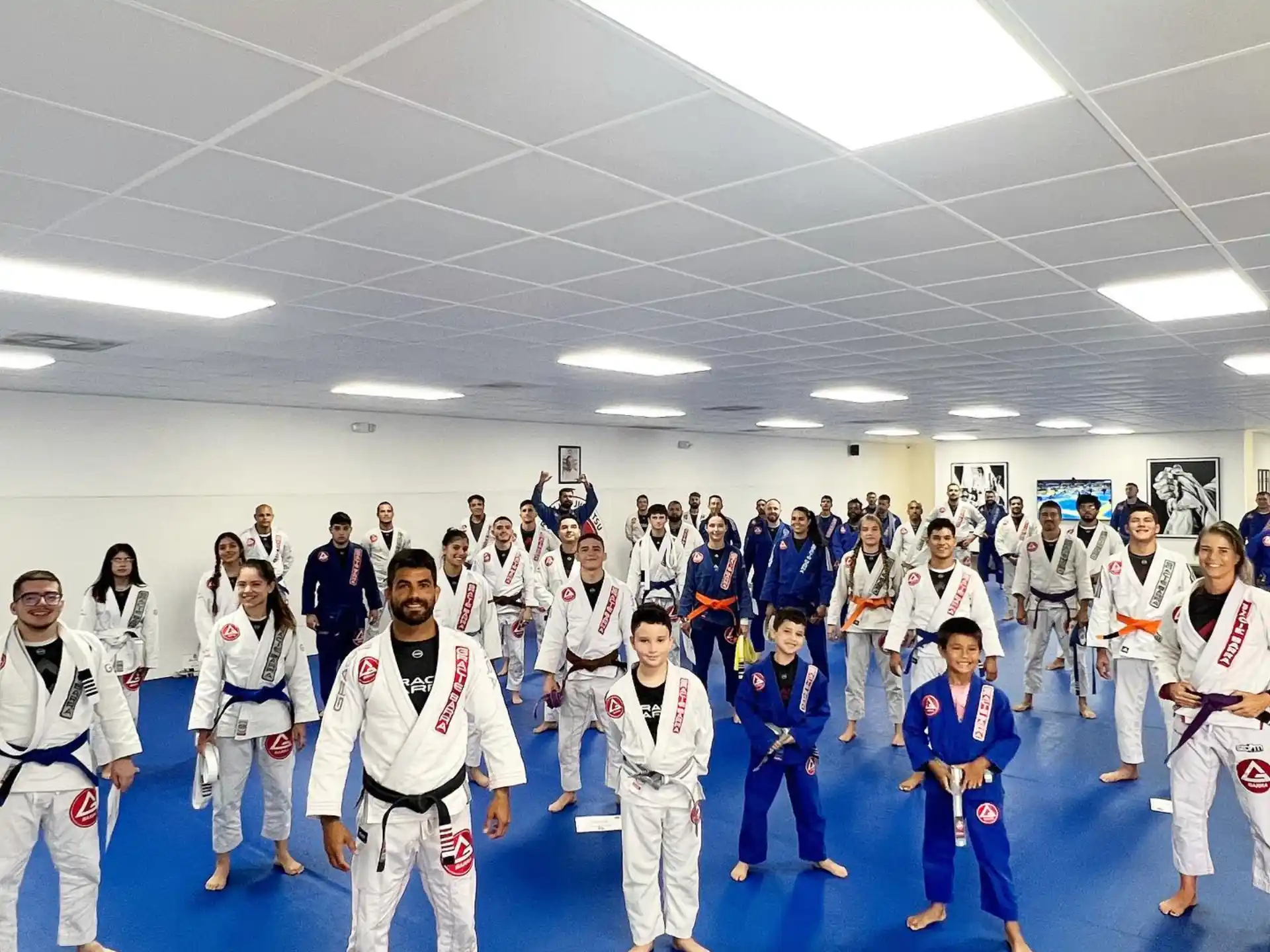 a group of people in karate uniforms