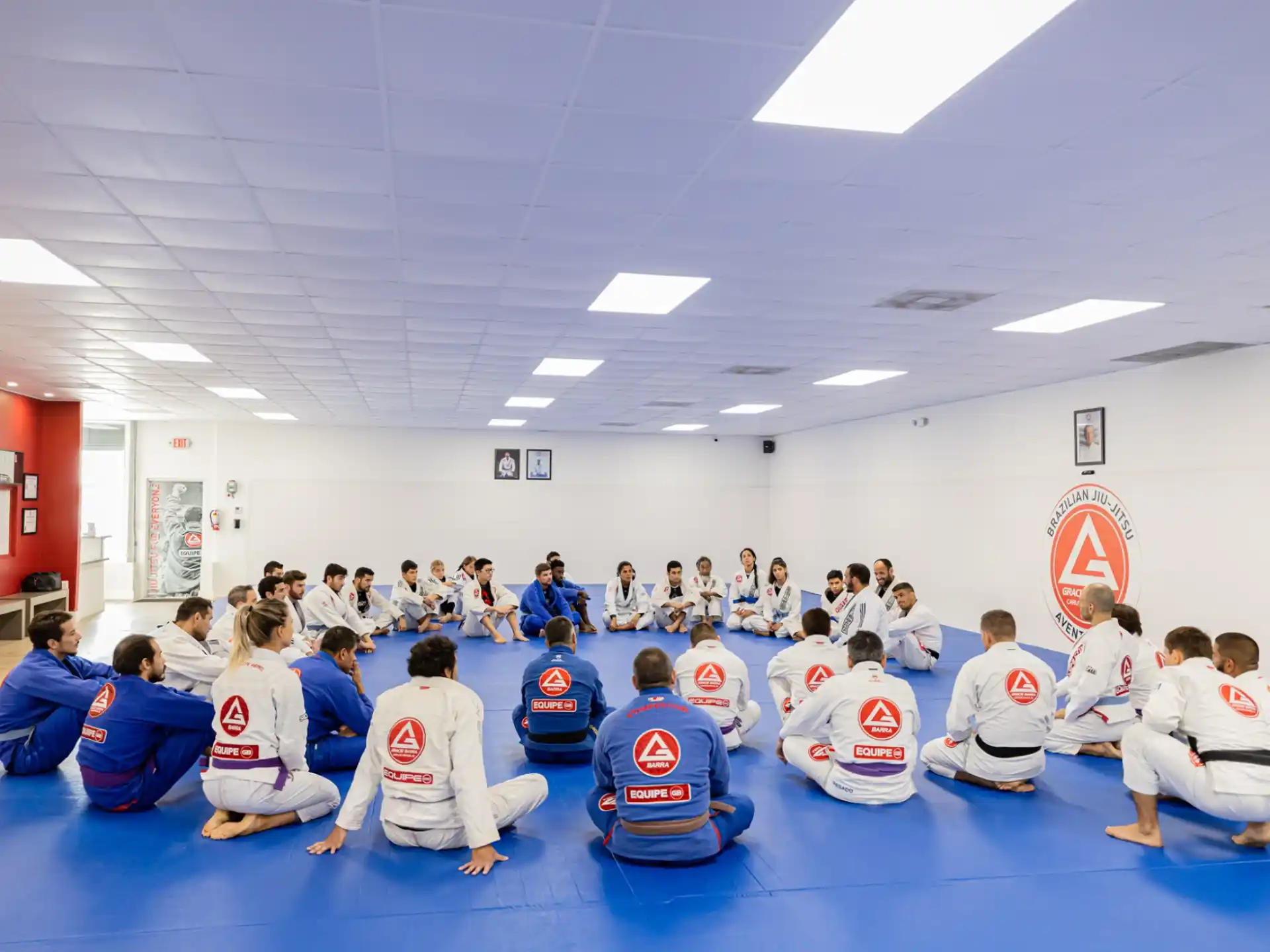 a group of people sitting in a circle in a room