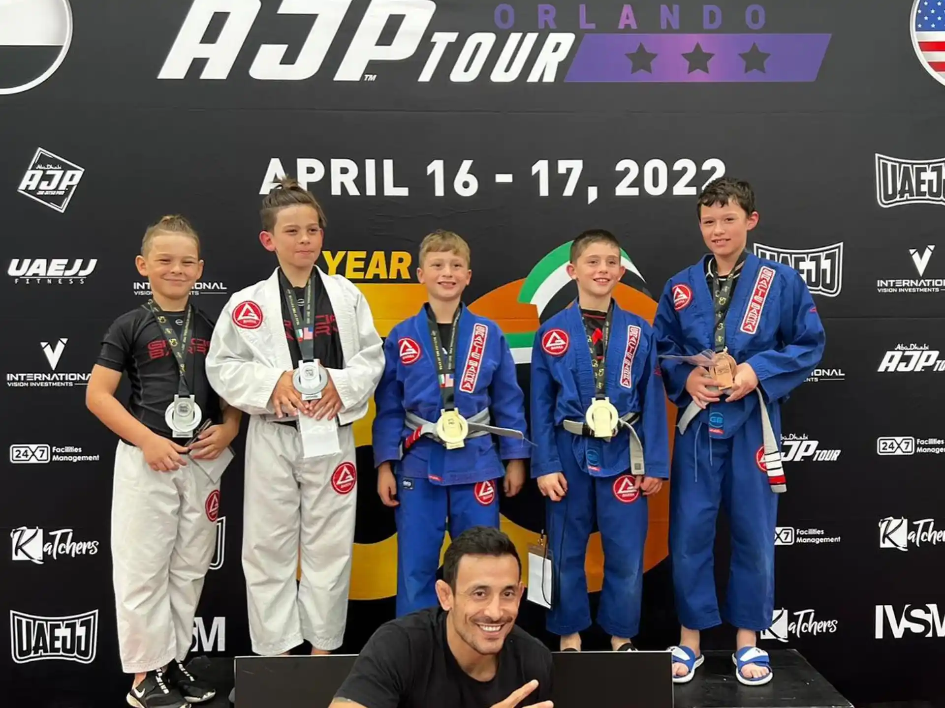 a group of men posing for a picture
