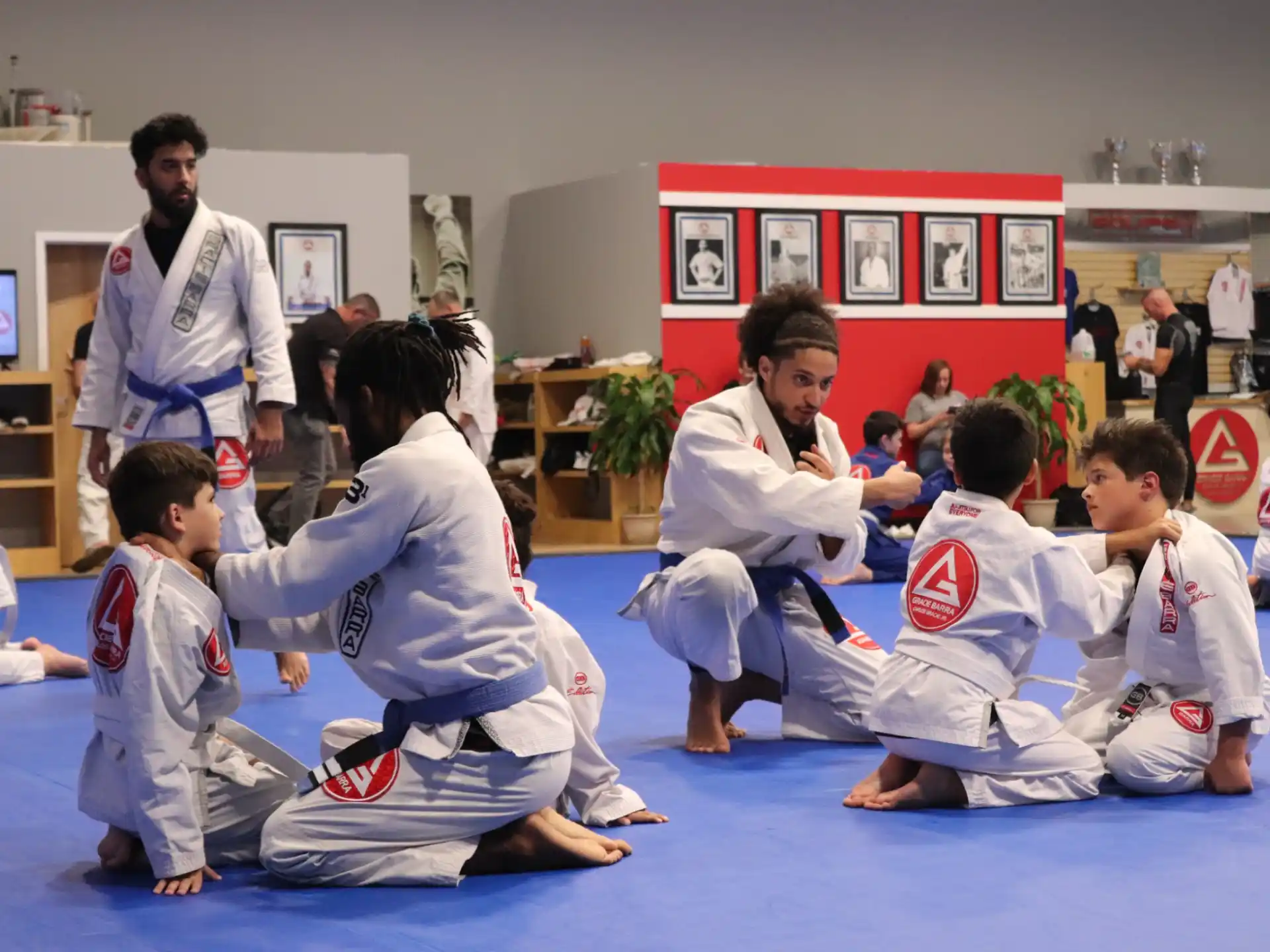 a group of people in karate uniforms