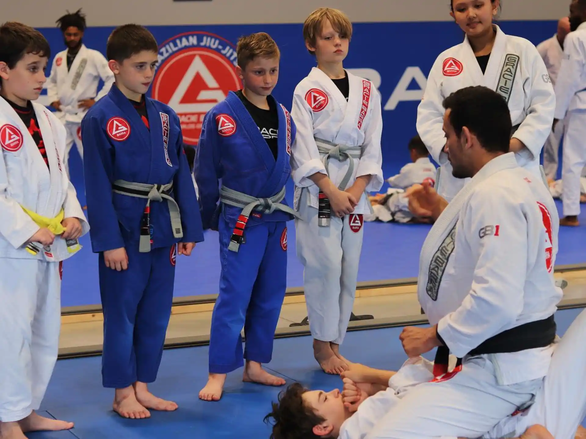 a group of people in karate uniforms