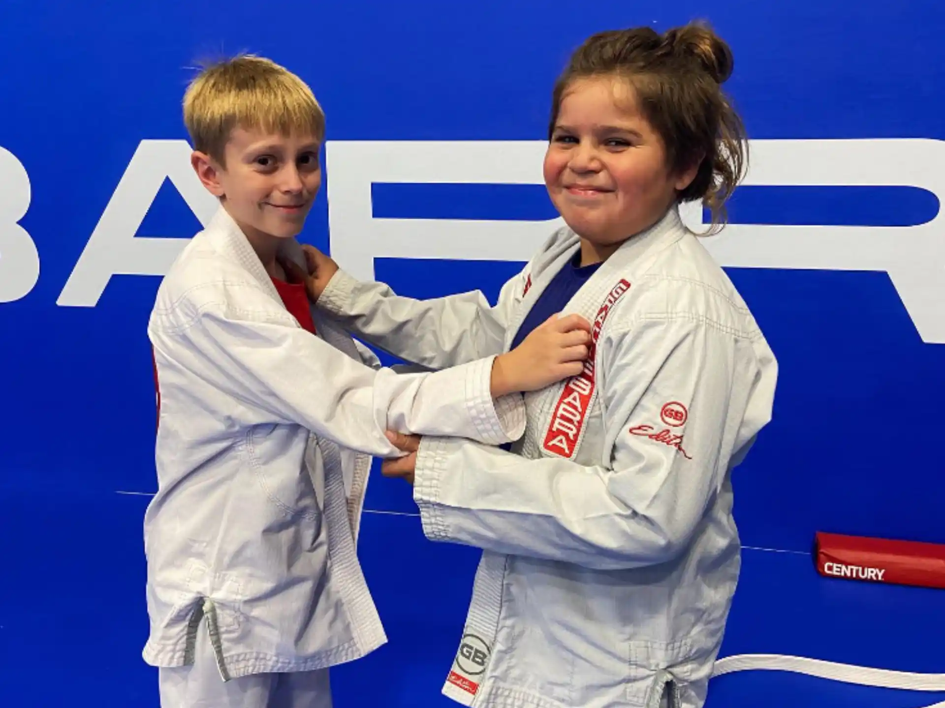 a person and a boy posing for a picture