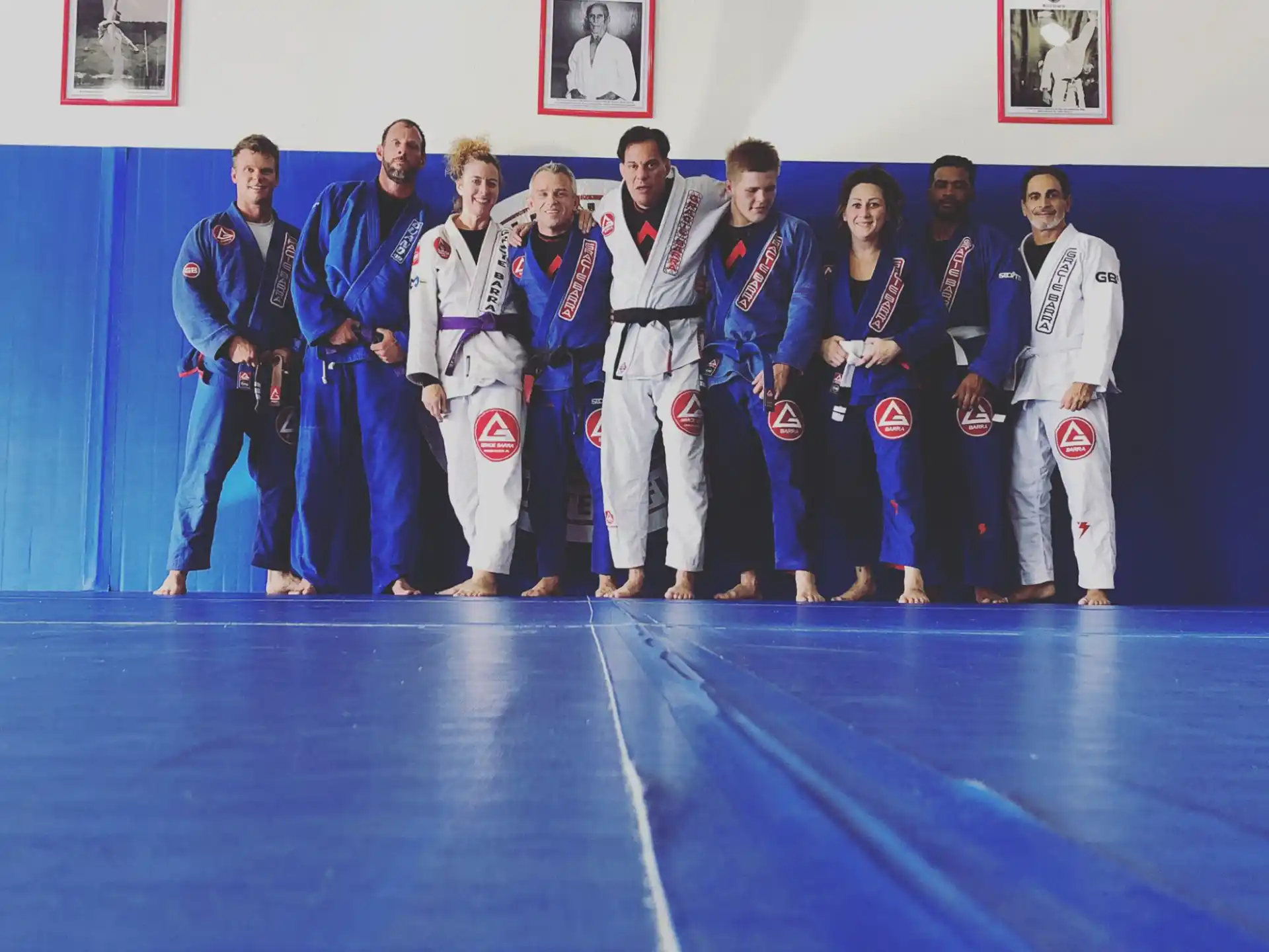 a group of people in karate uniforms