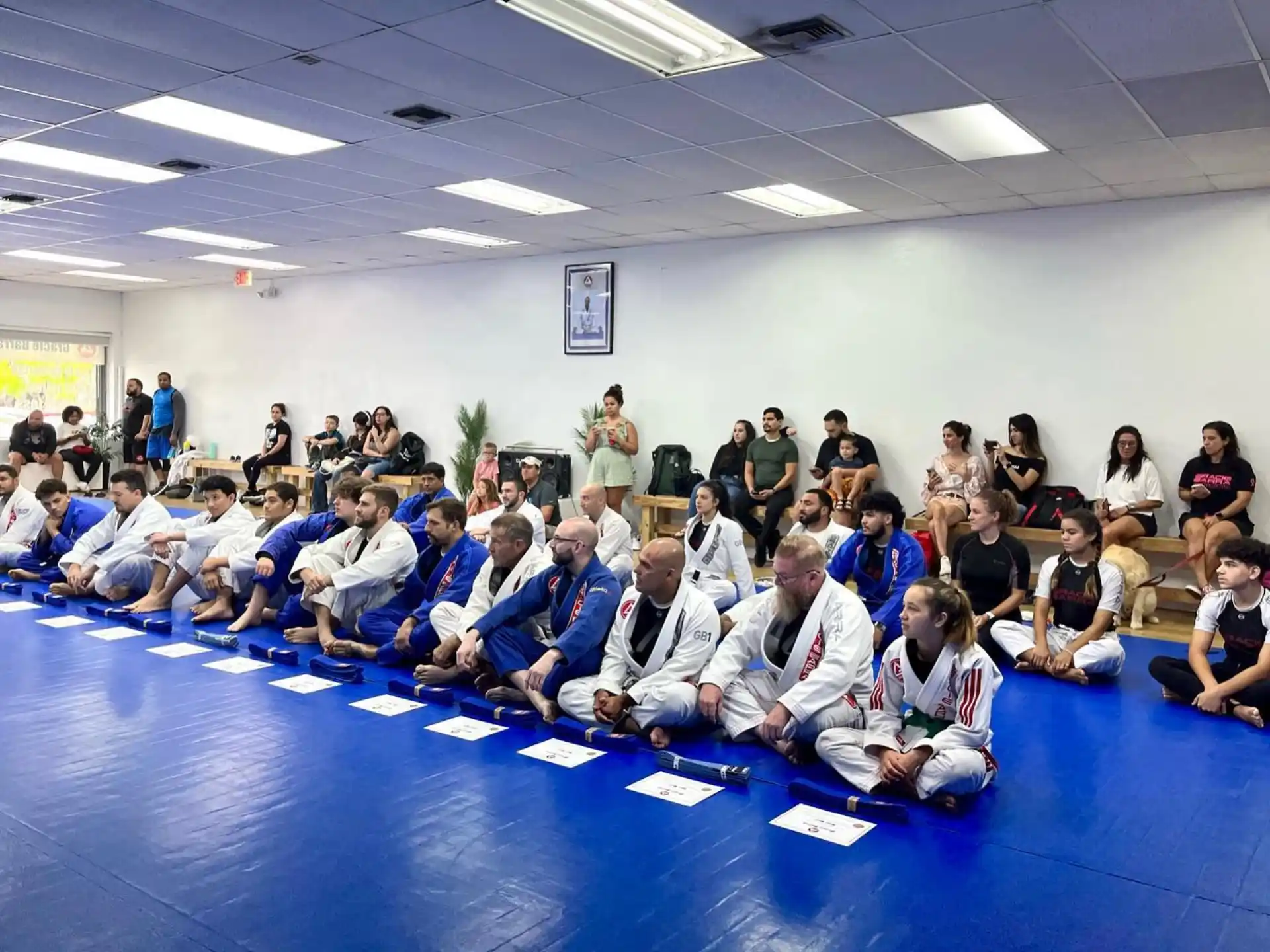 a group of people sitting on the floor