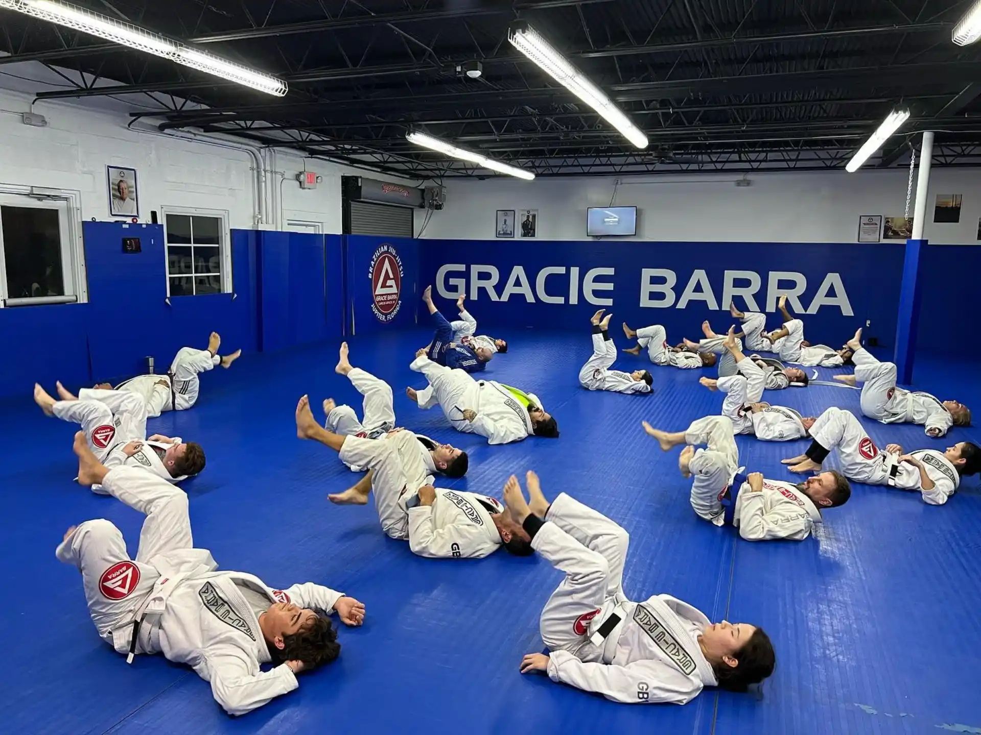 a group of people in karate uniforms
