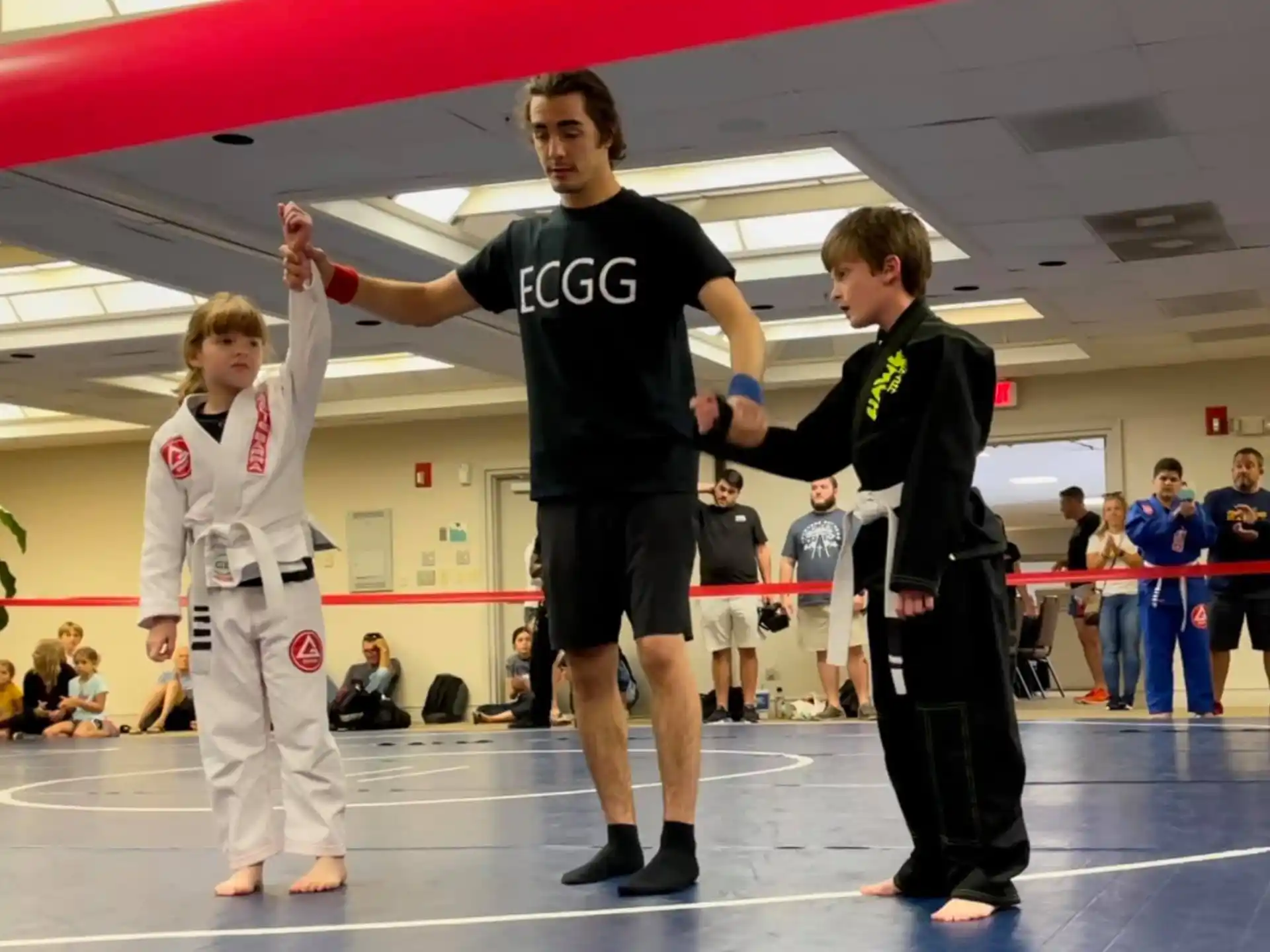 a group of people in karate uniforms