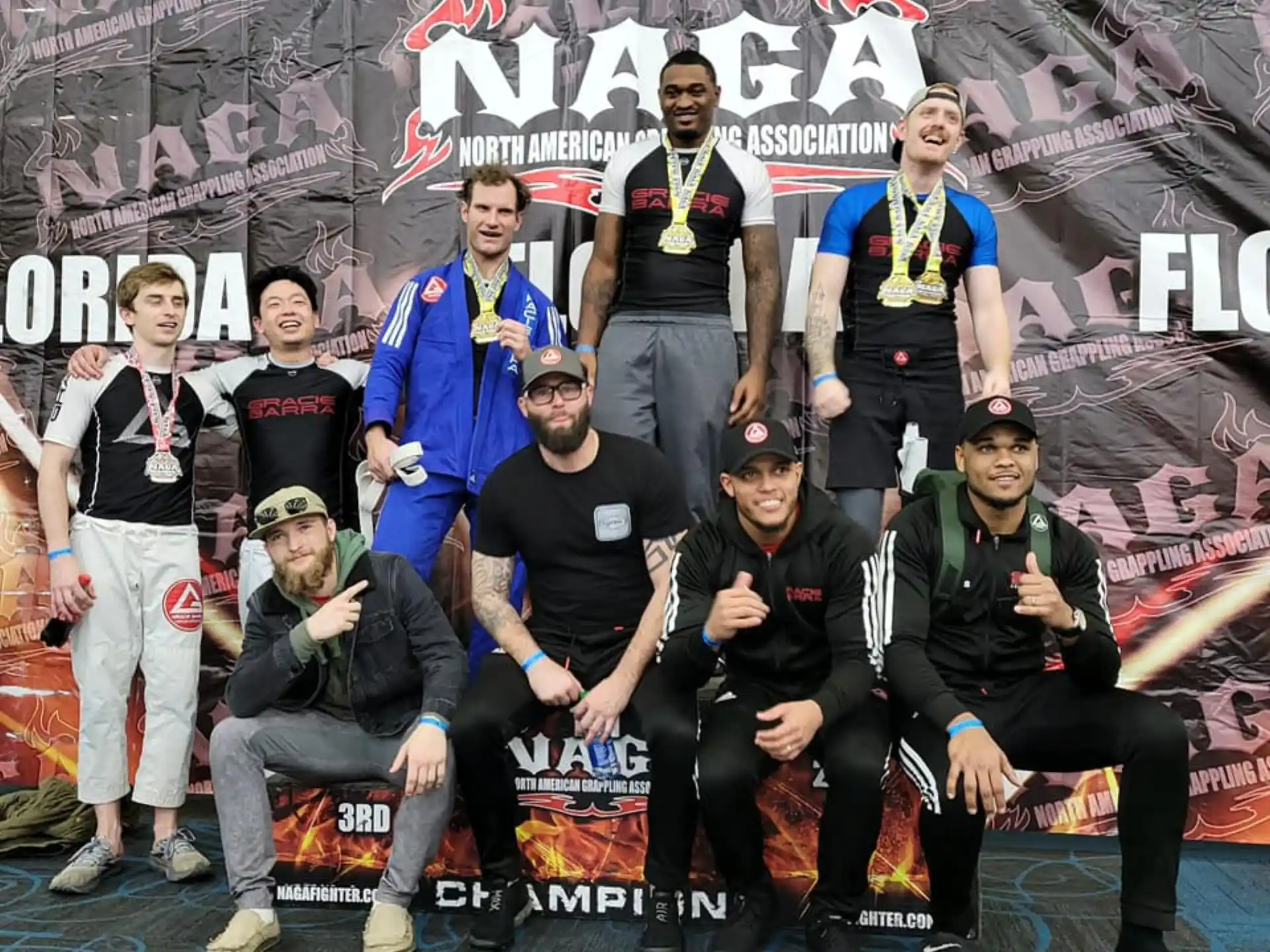 a group of men posing for a picture