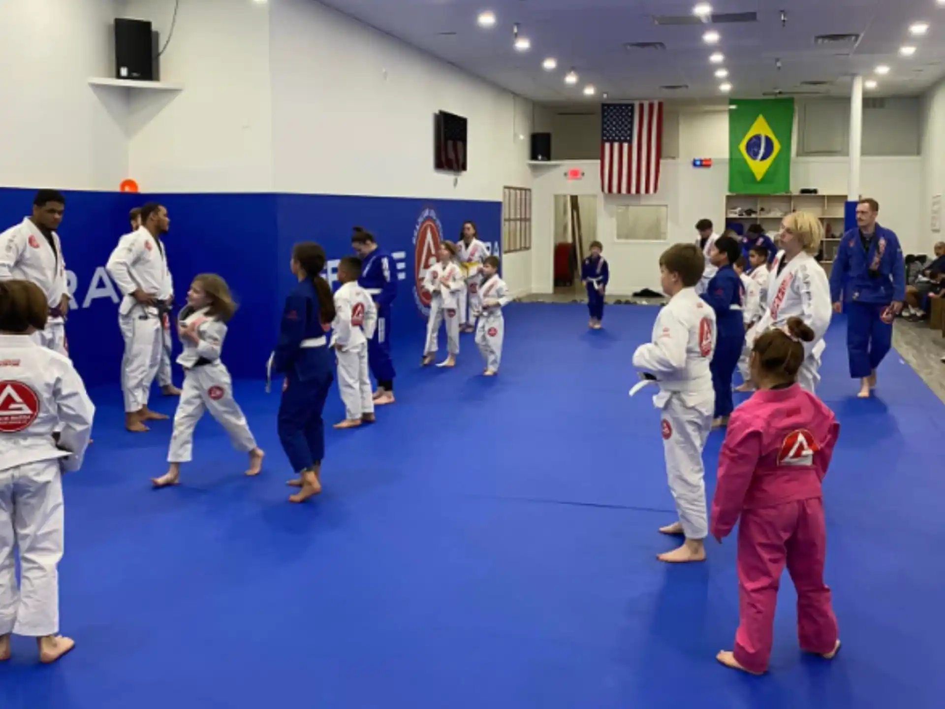 a group of people in a karate class