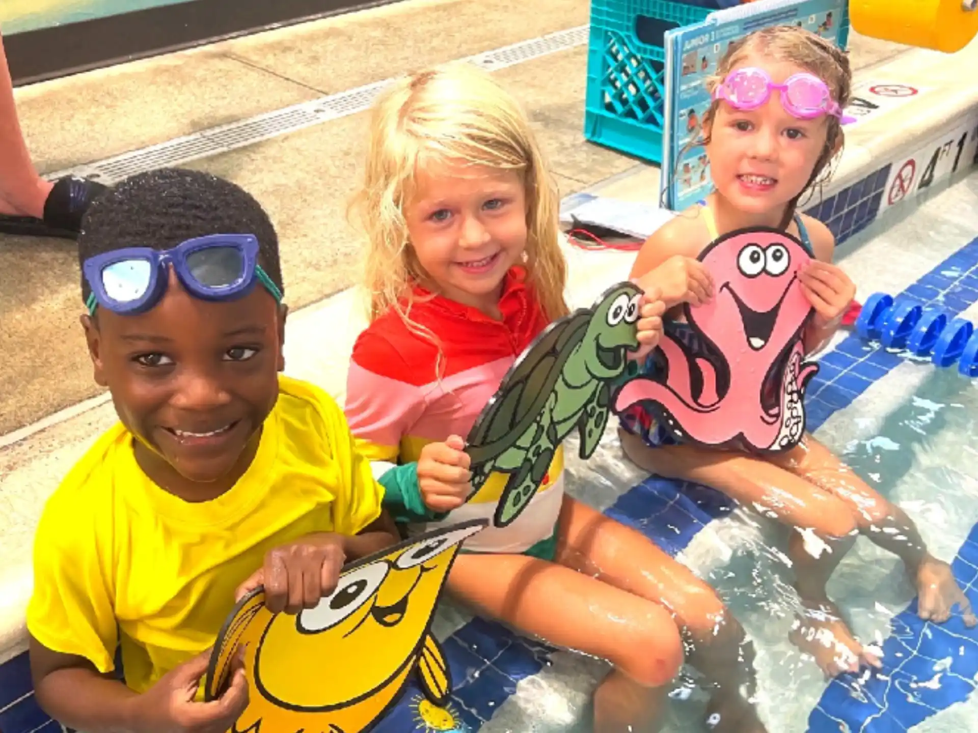 a group of children in a pool
