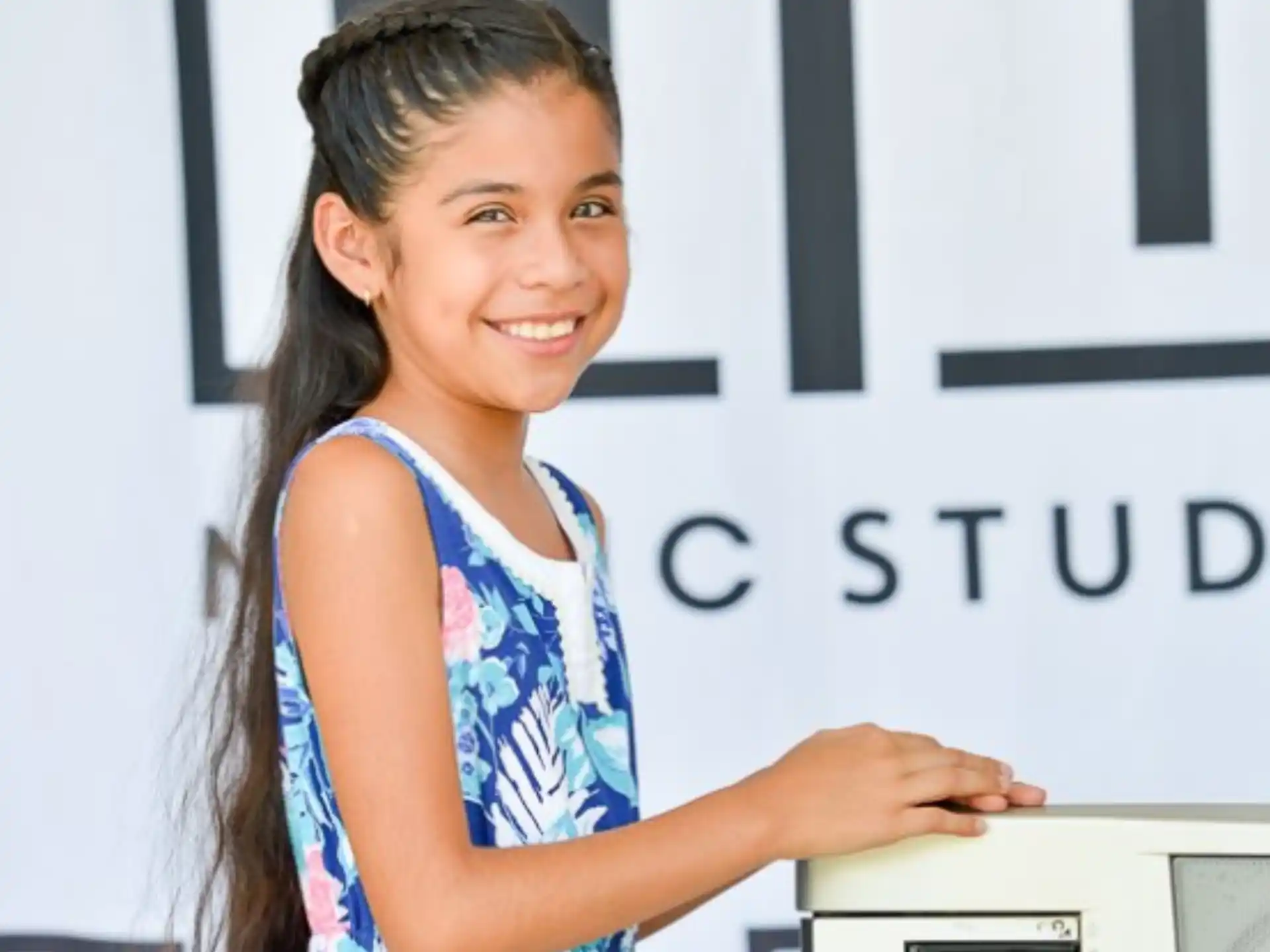 a young girl smiling