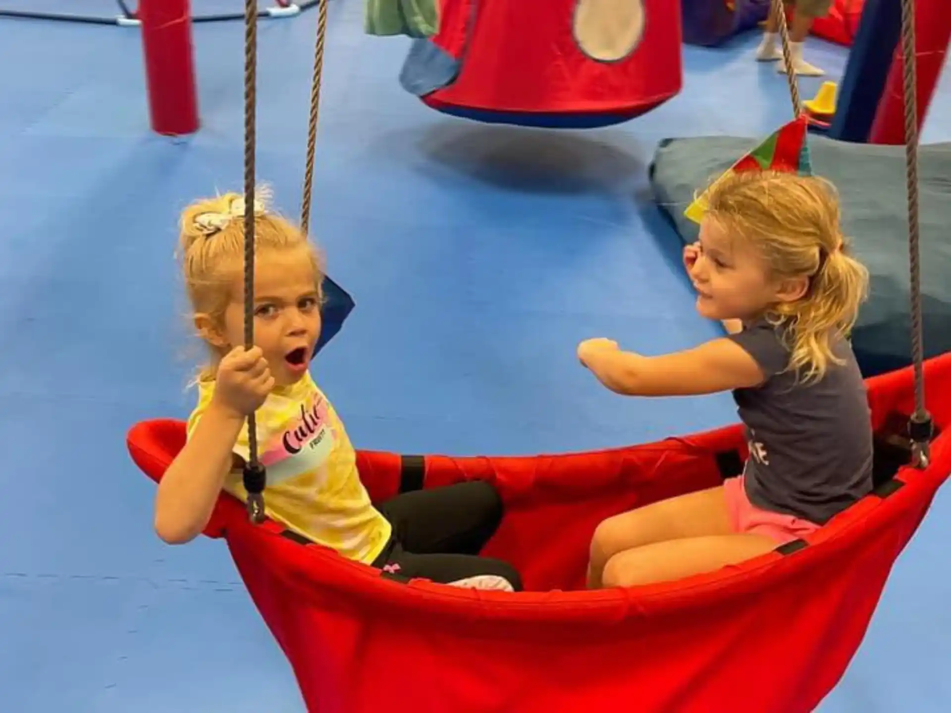 two children on a swing