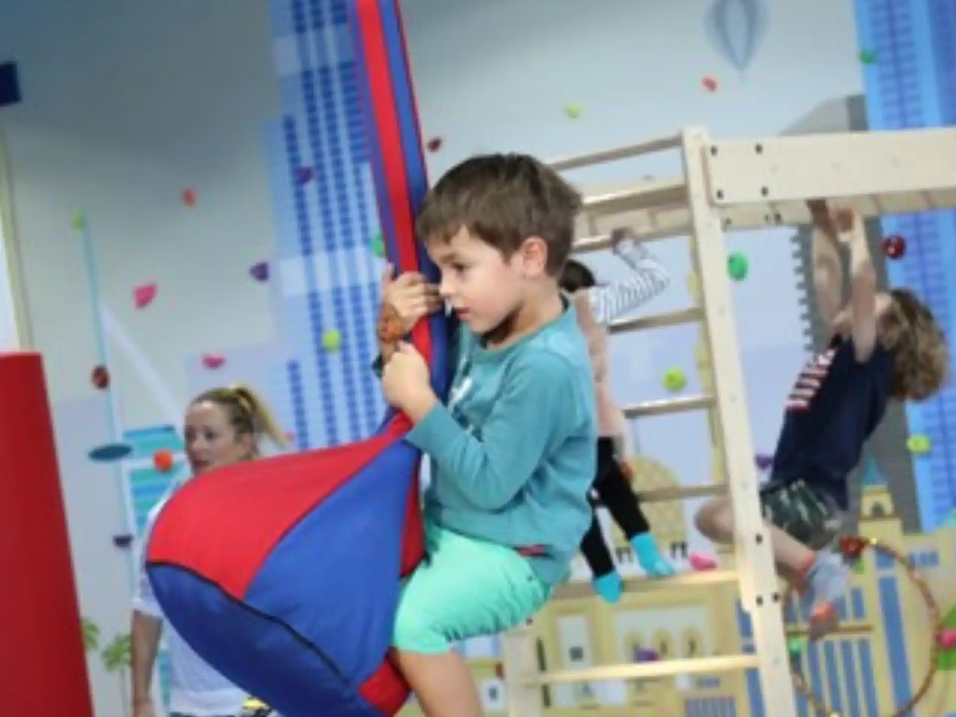 a group of kids playing on a playground