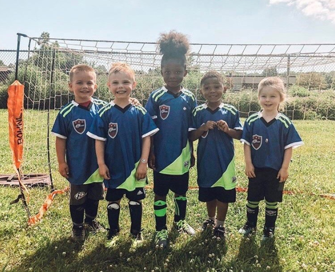 a group of children in uniform