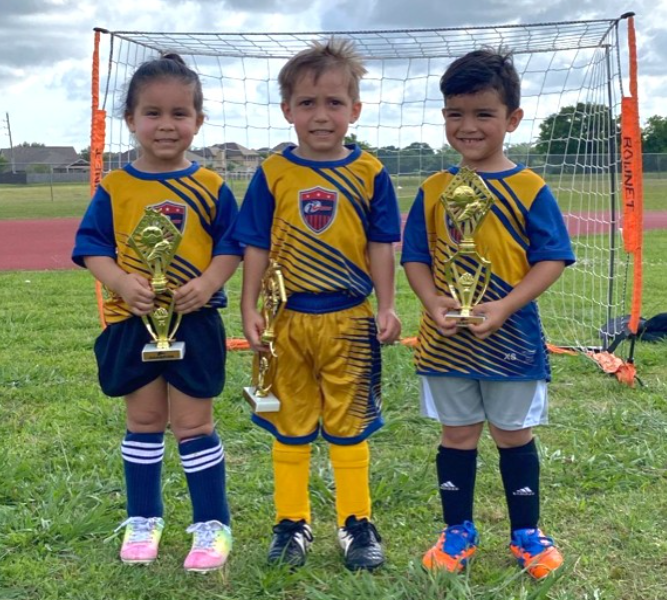 a group of kids in football uniforms