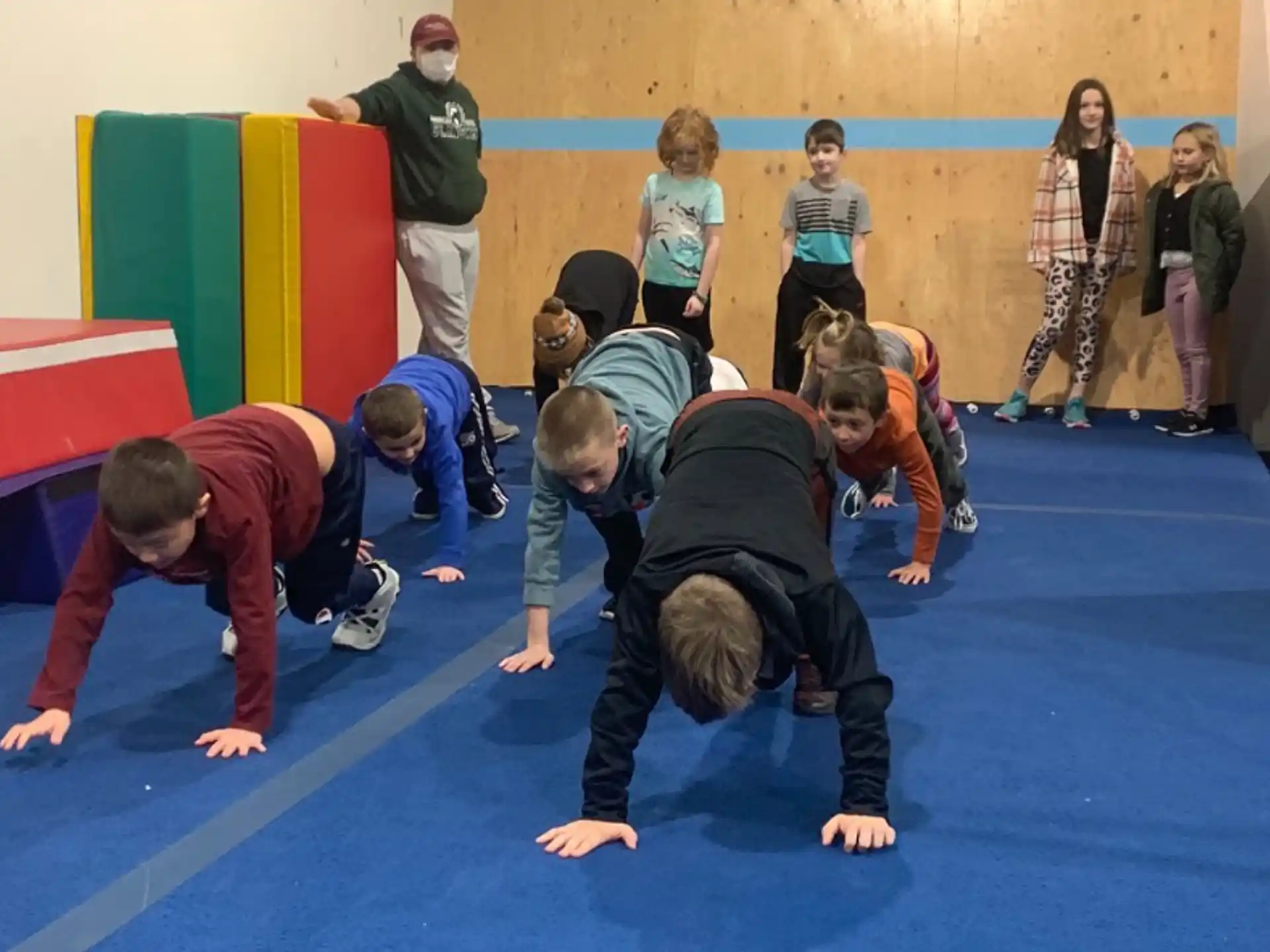 a group of people in a gym