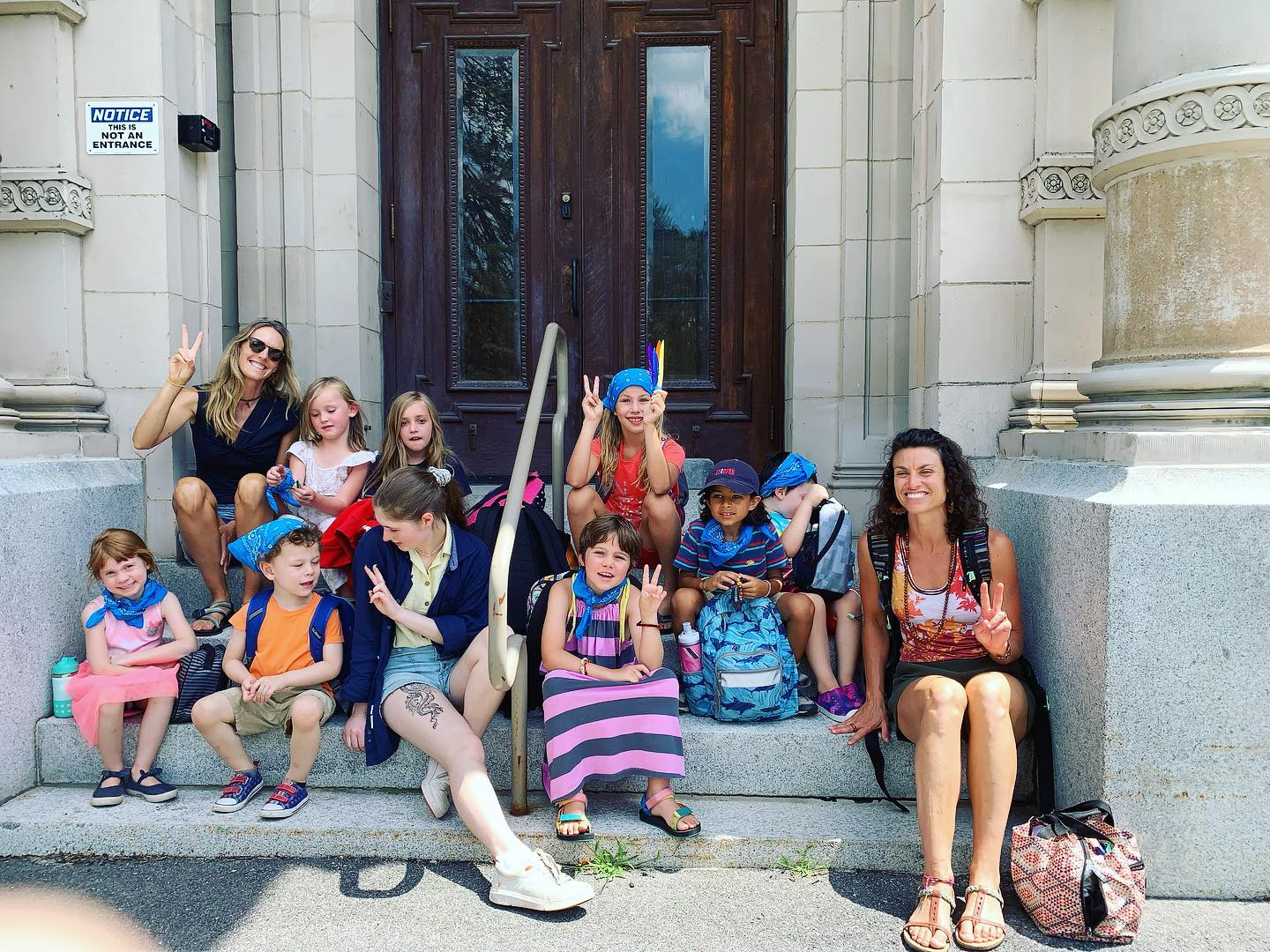 a group of people sitting on steps