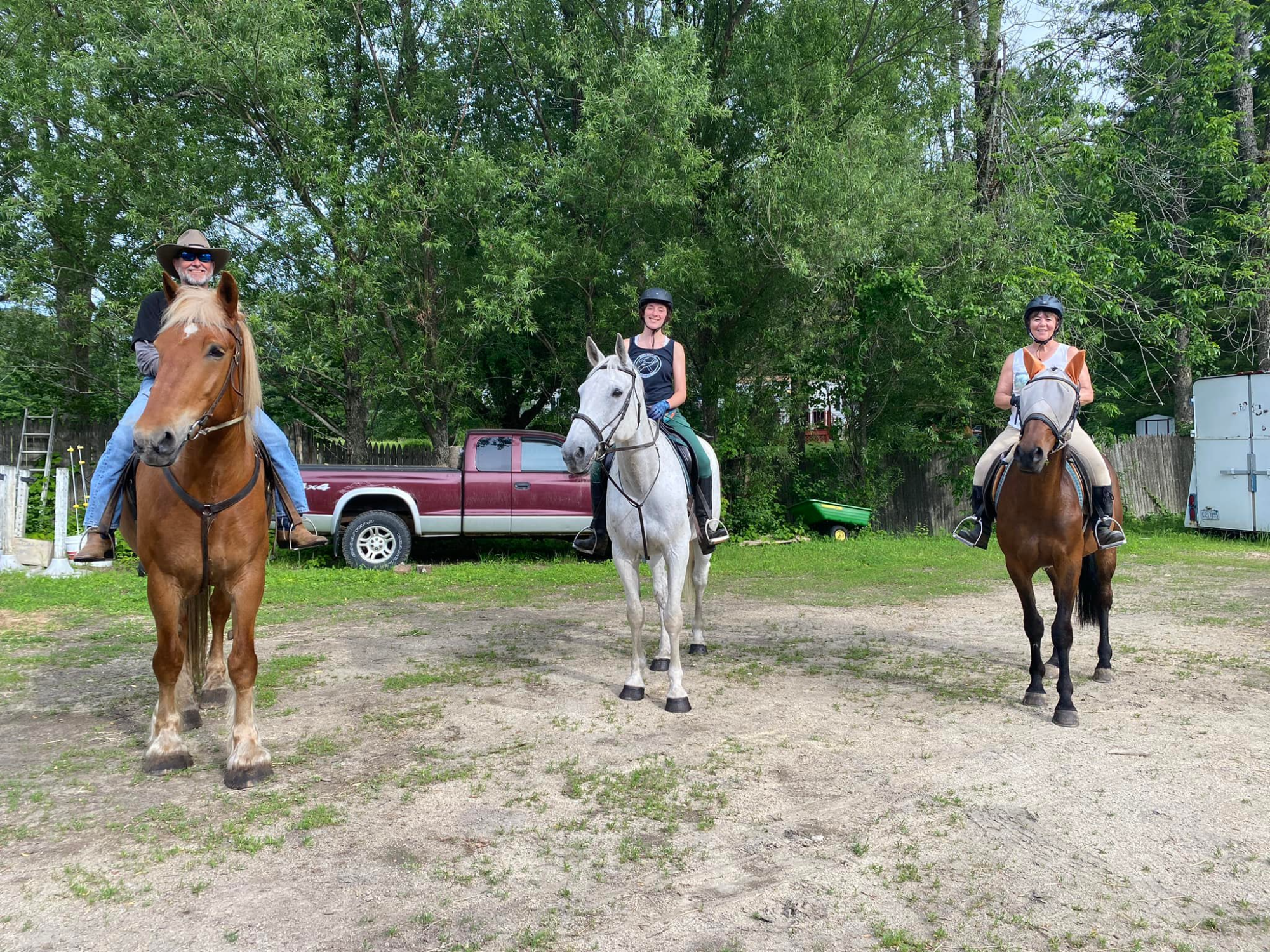 a group of people riding horses