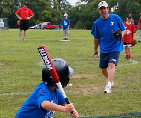 a person holding a baseball bat