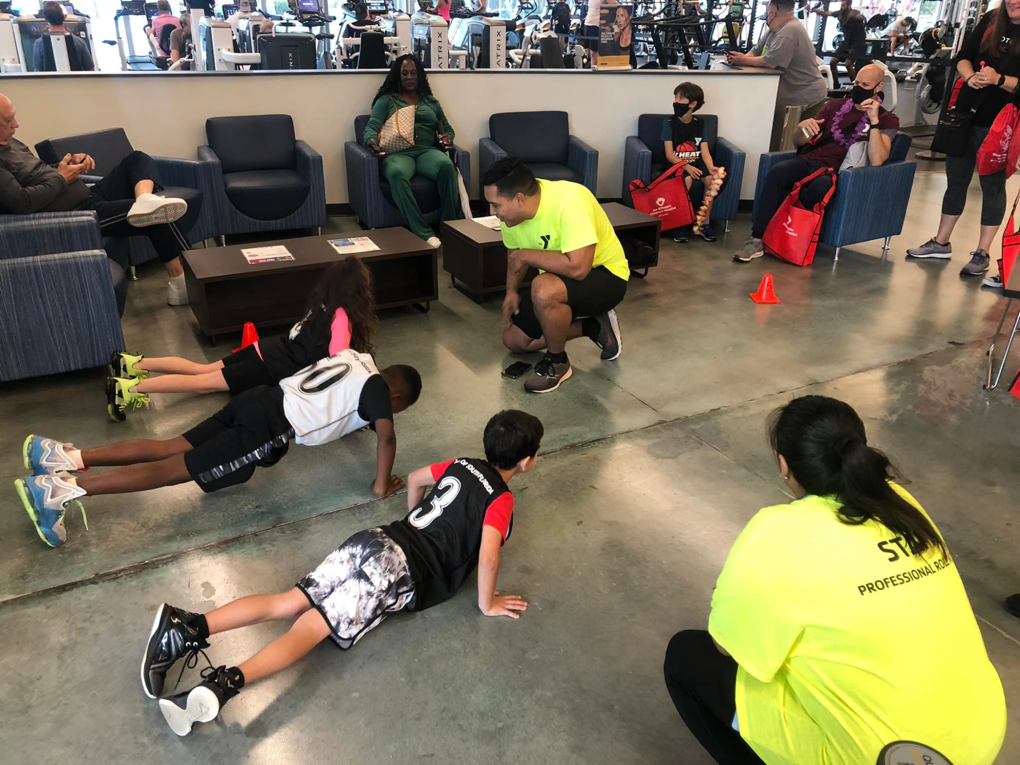 a group of people sitting on the floor