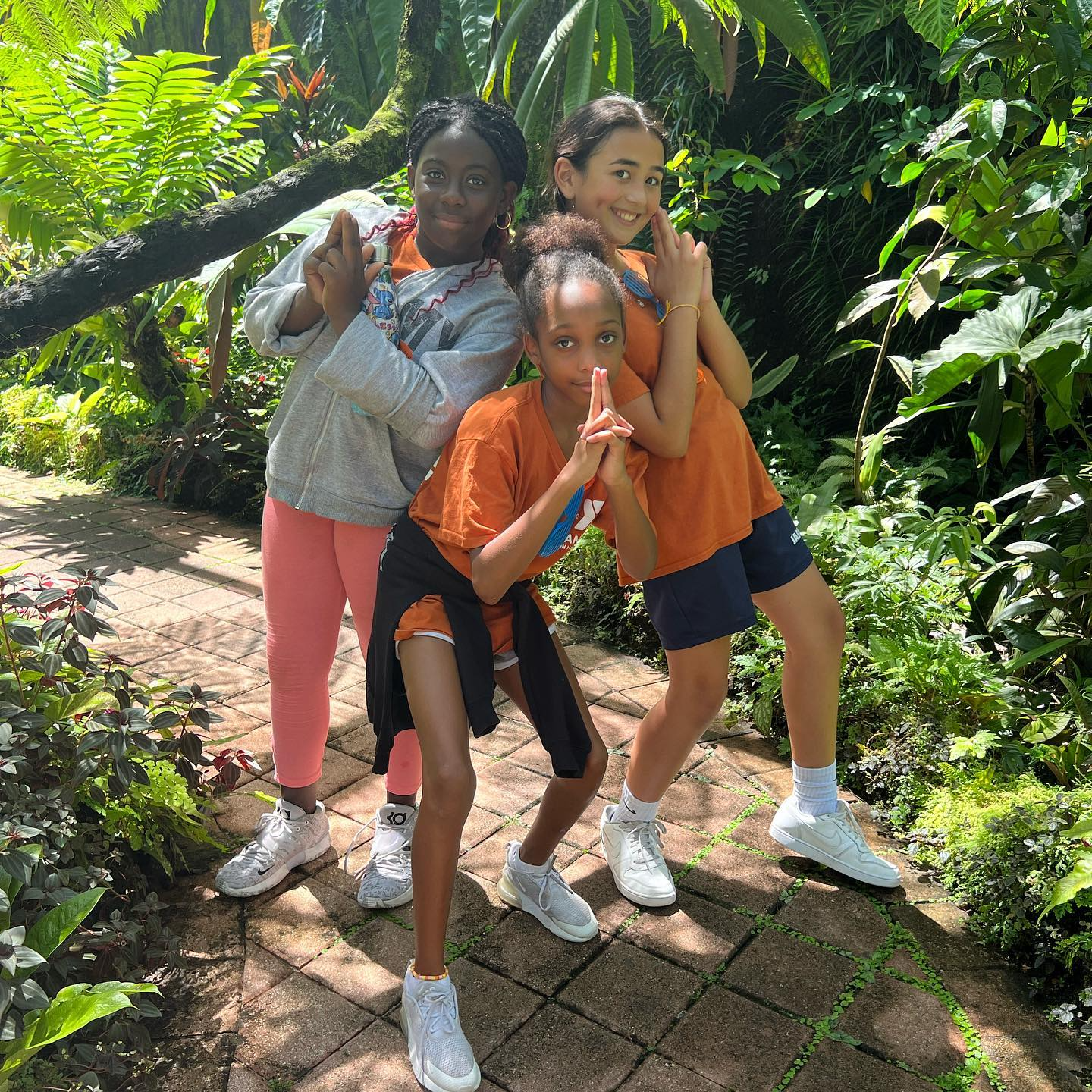 a group of children posing for a photo