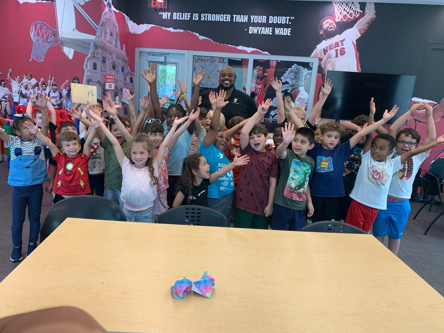 a group of children posing for a photo