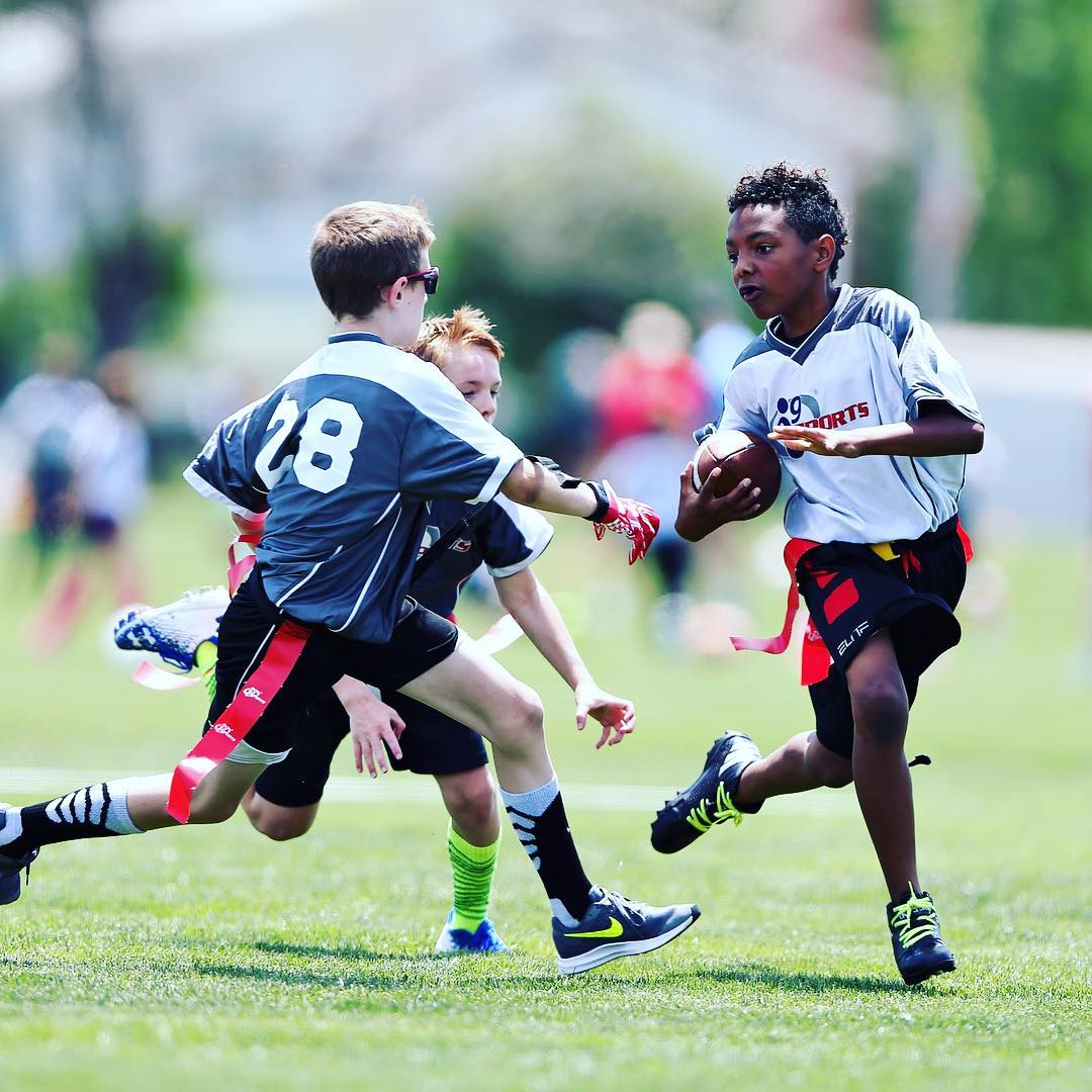 a group of men playing rugby