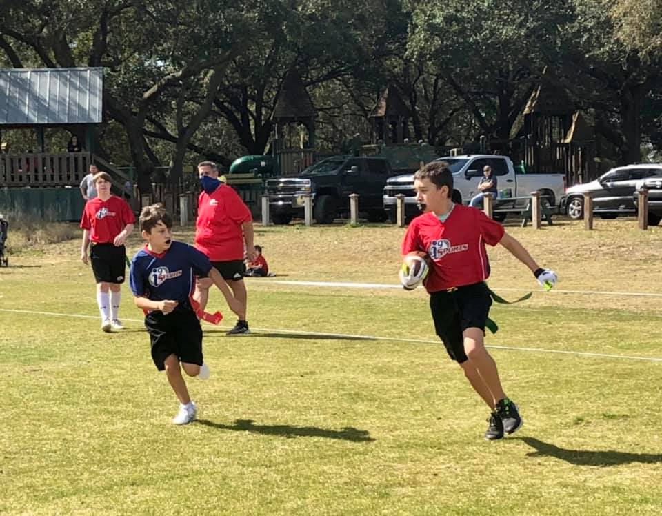 a group of people playing rugby