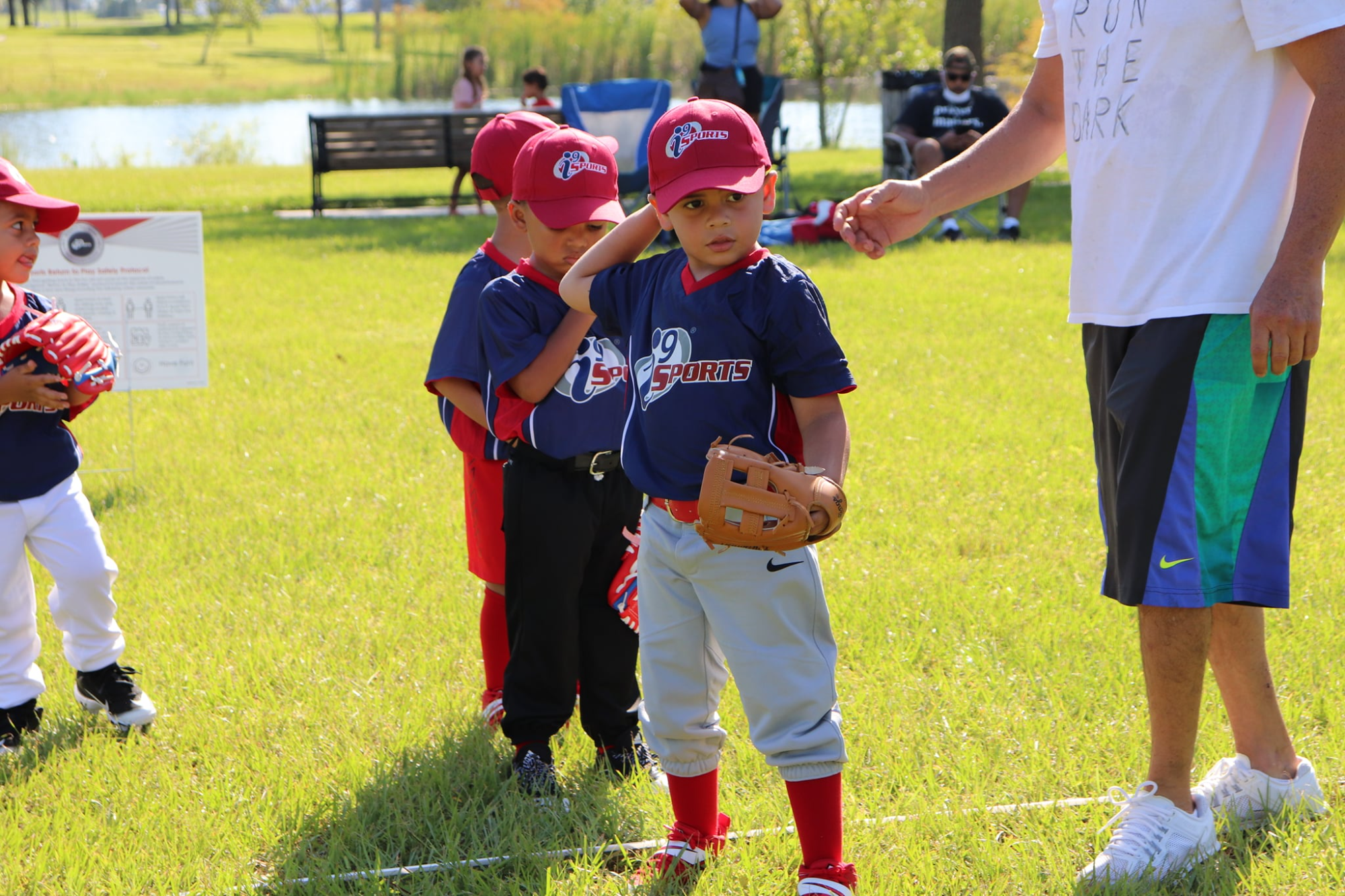 a group of kids stand on a field