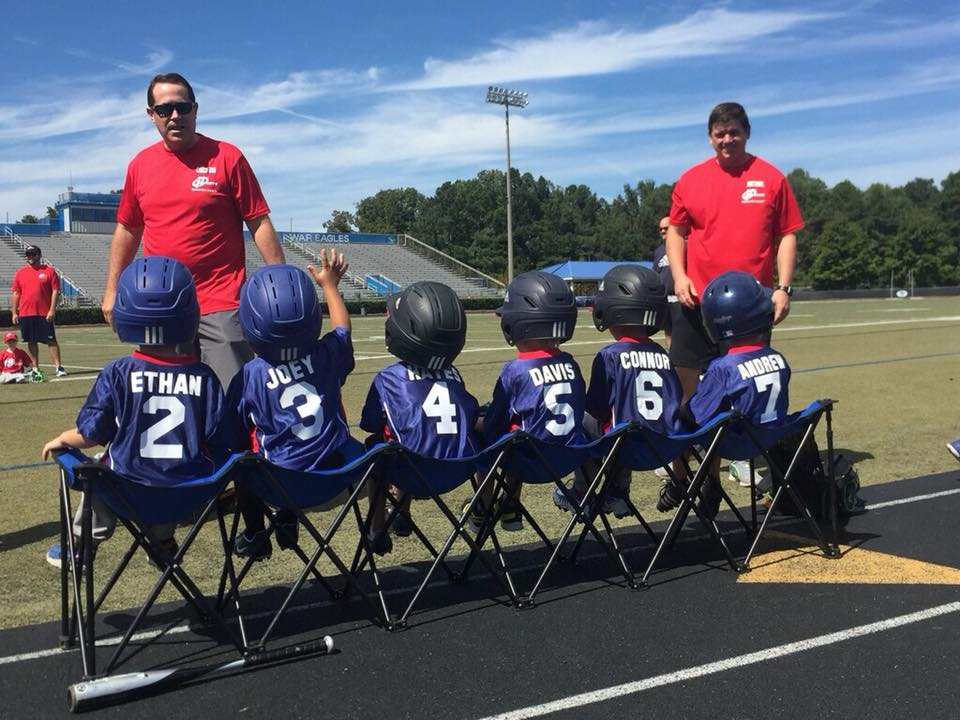 a group of people sitting in chairs