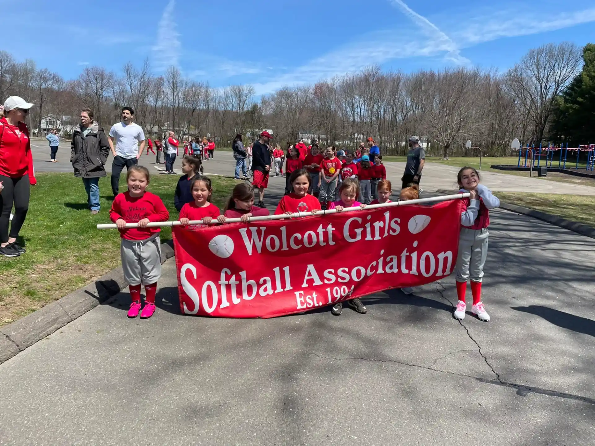 a group of people holding a sign