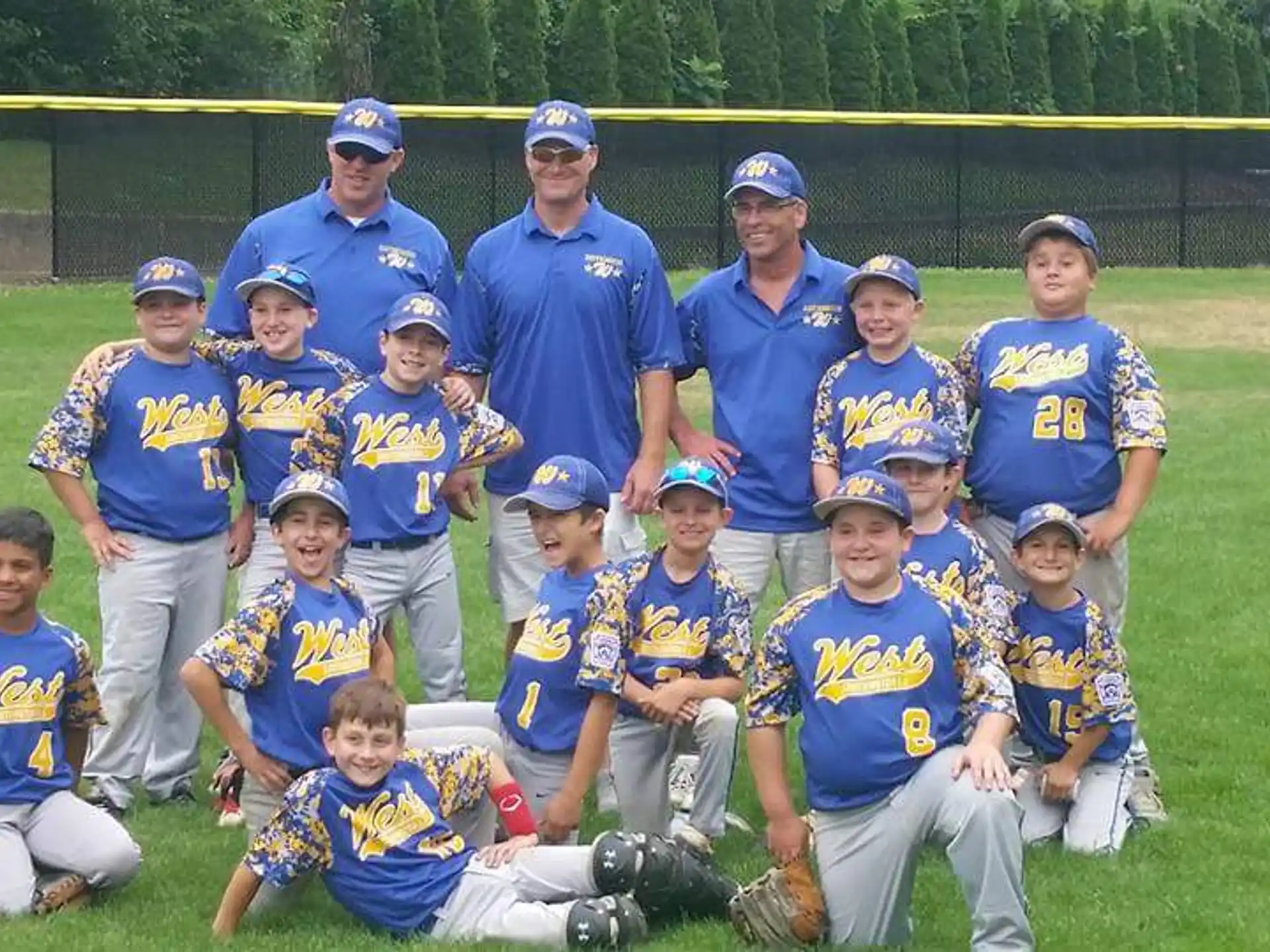 a group of people wearing baseball uniforms
