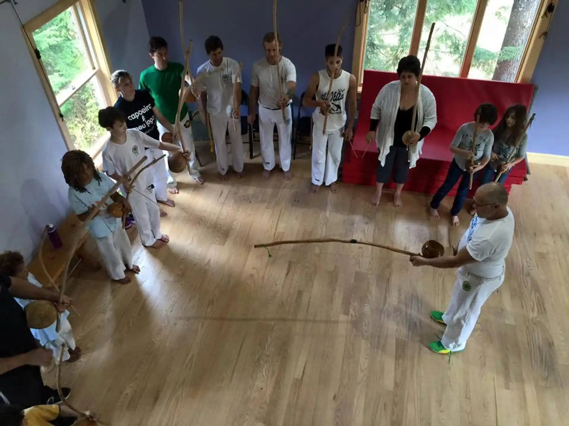 a group of people in karate uniforms