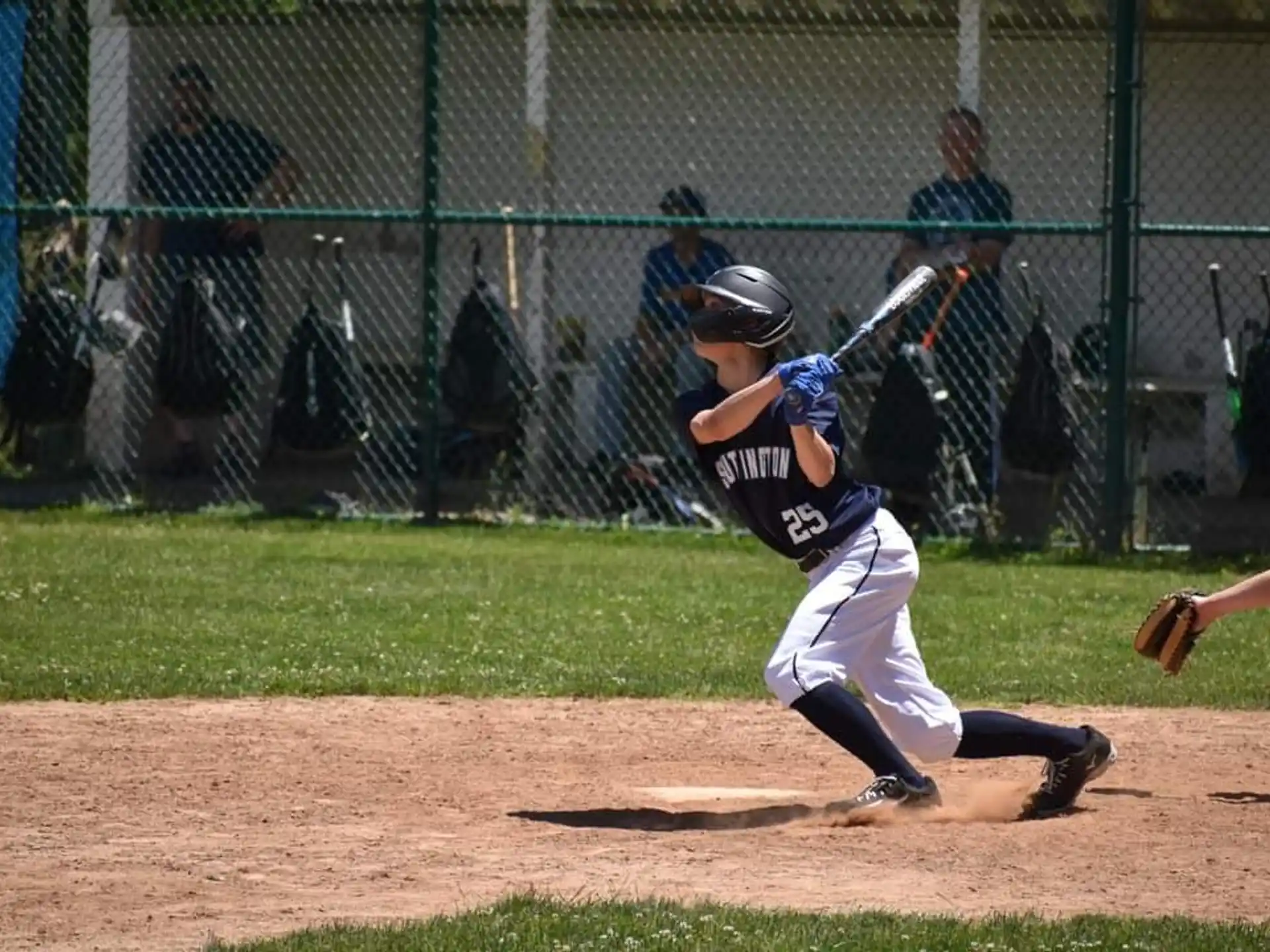 a baseball player swinging a bat