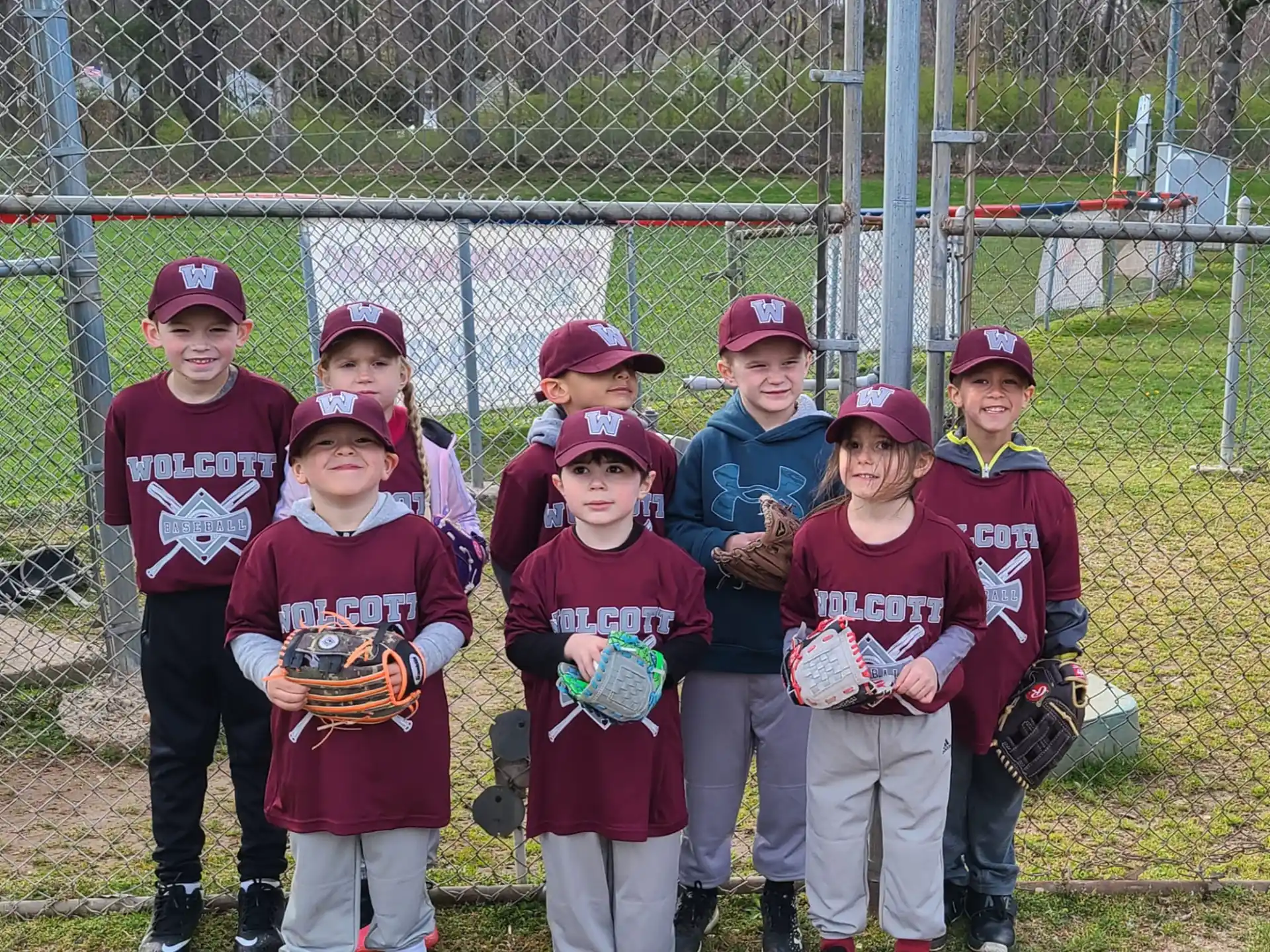 a group of kids pose for a picture