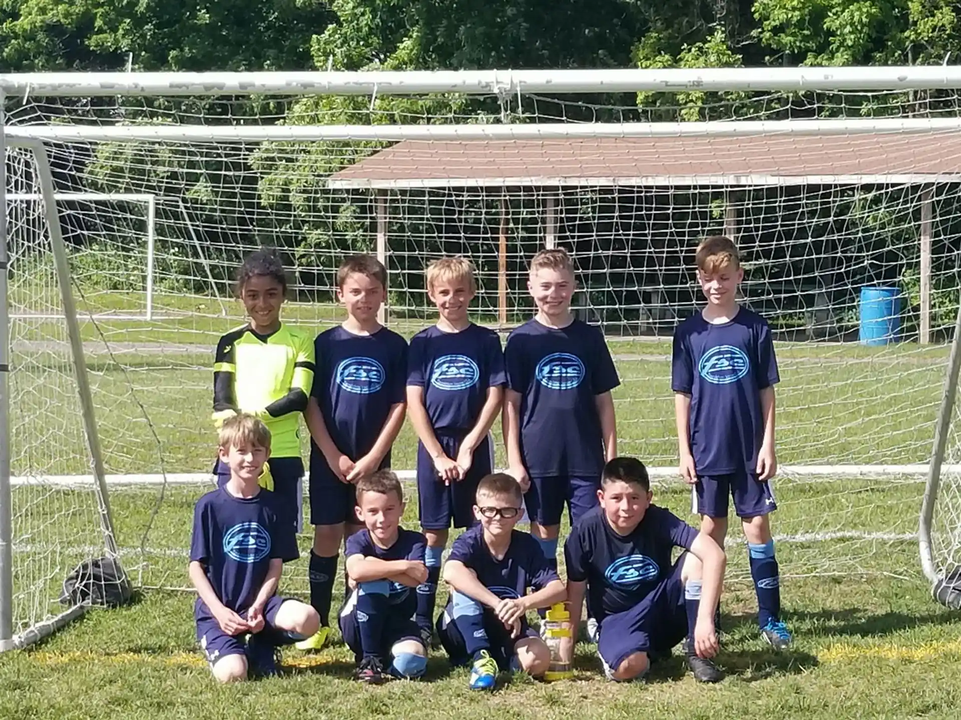a group of boys posing for a picture