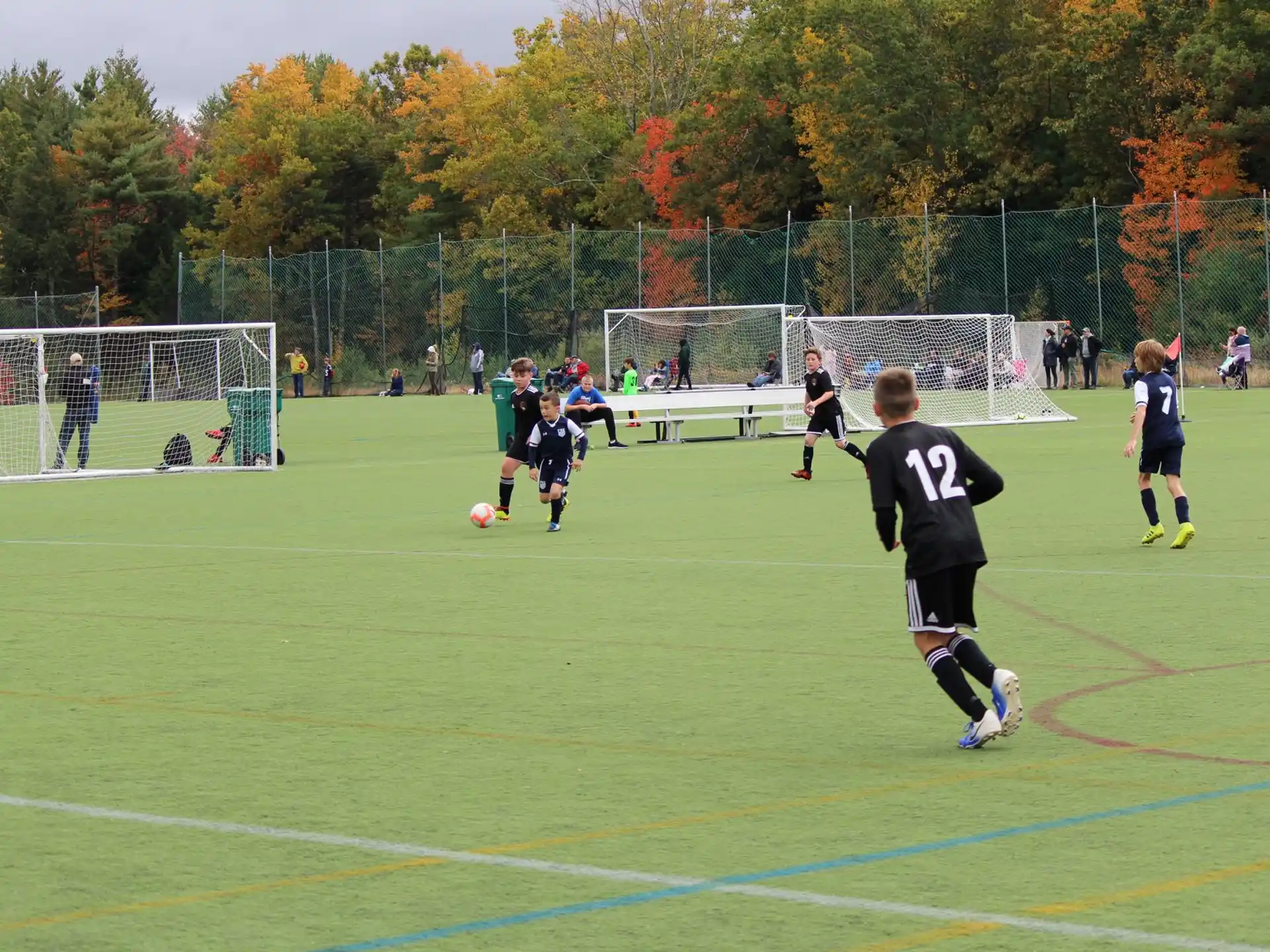 a group of people playing football