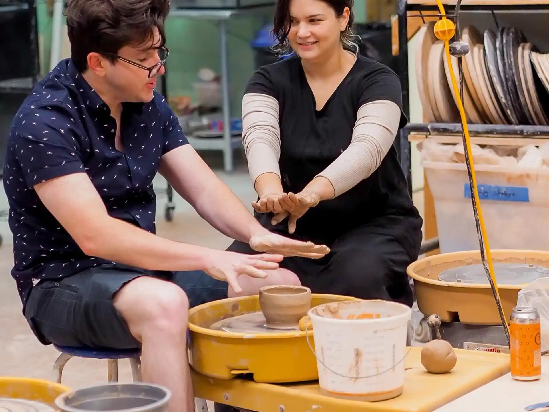 a couple of women working in a shop