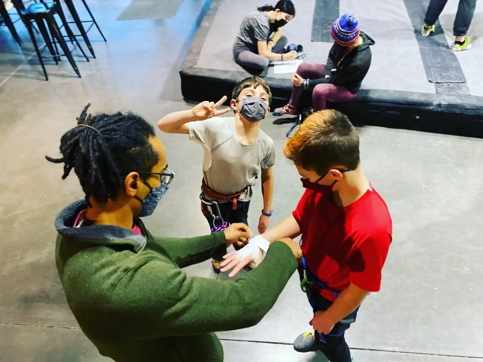 a group of people wearing masks