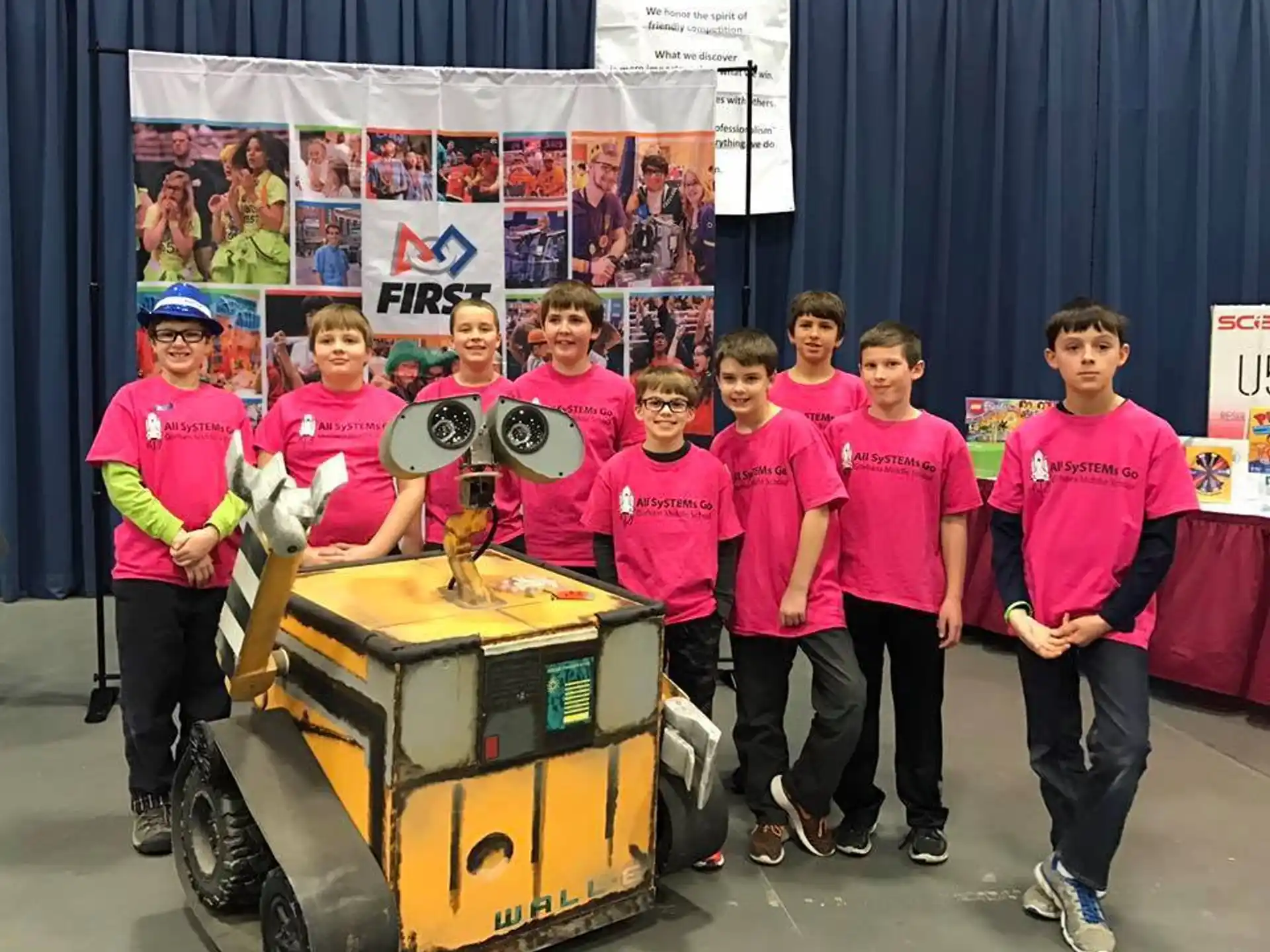 a group of kids posing for a photo