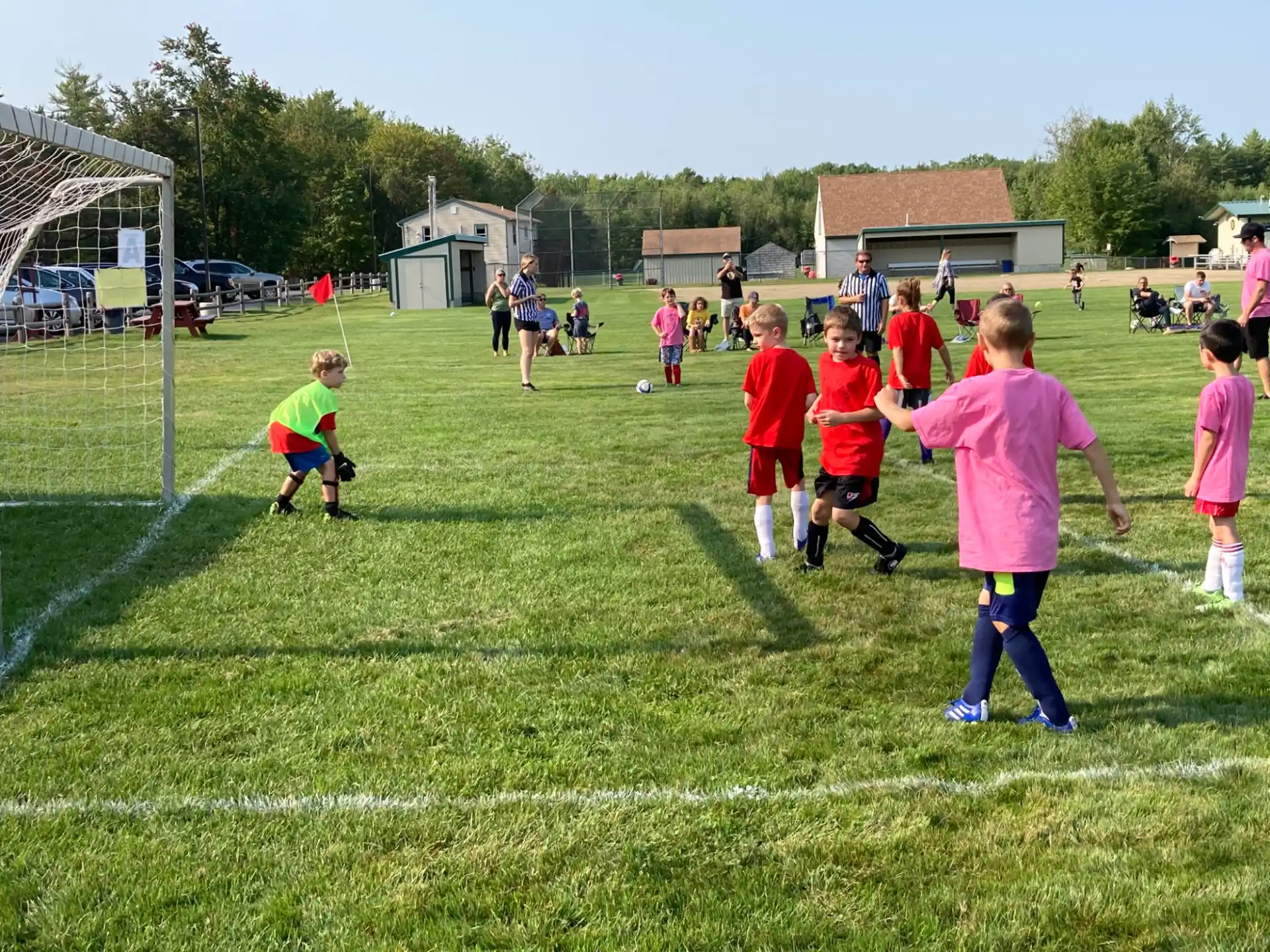 a group of kids playing football