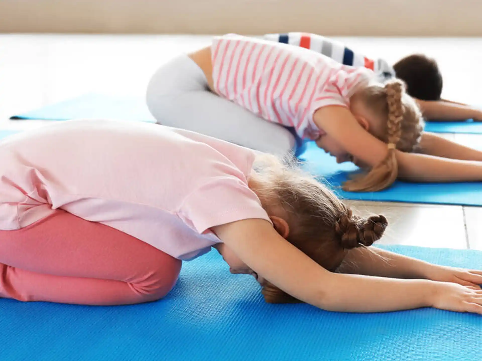a group of children lying on the floor
