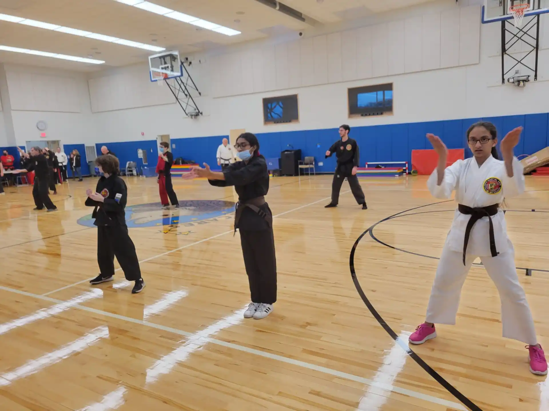 a group of people in a gym