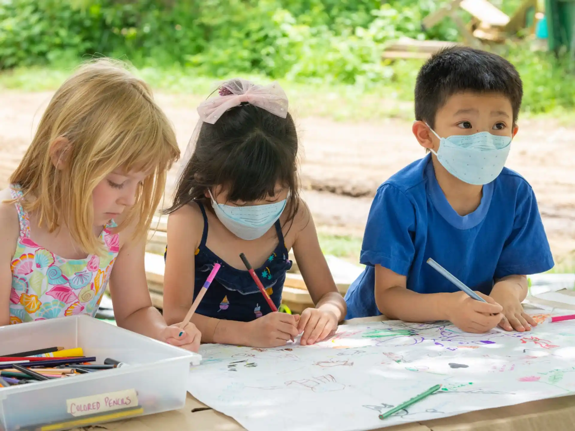 children with paint on their faces