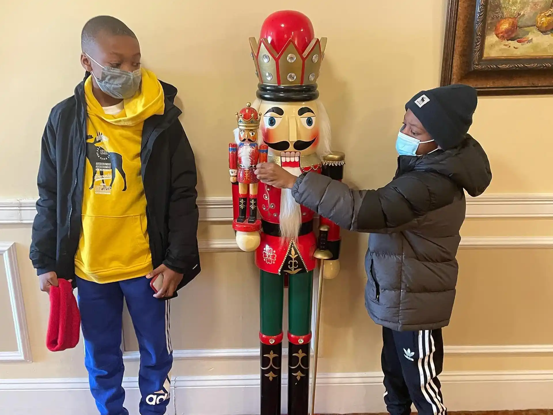 a person and a boy wearing clothing