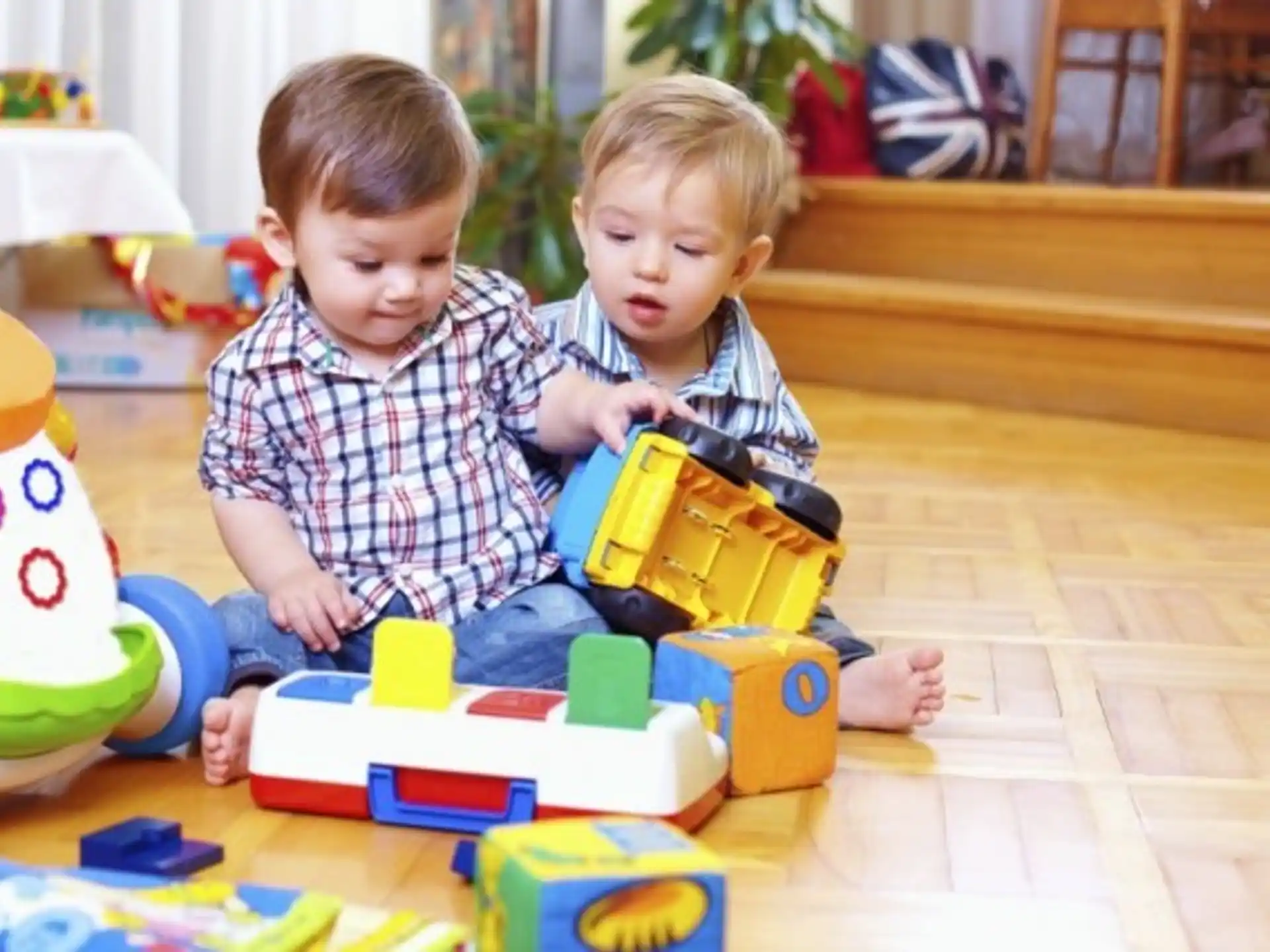 two children playing with toys