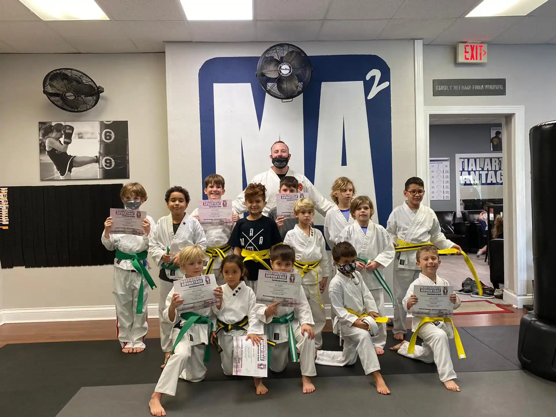 a group of children posing for a photo