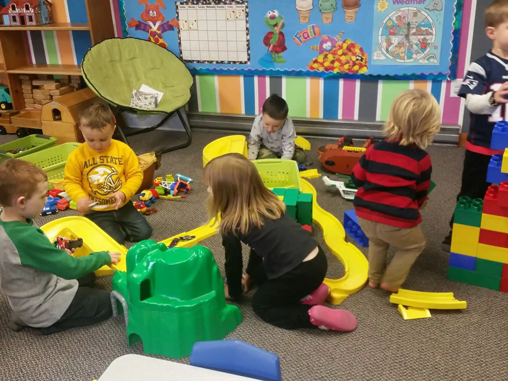 children playing in a classroom