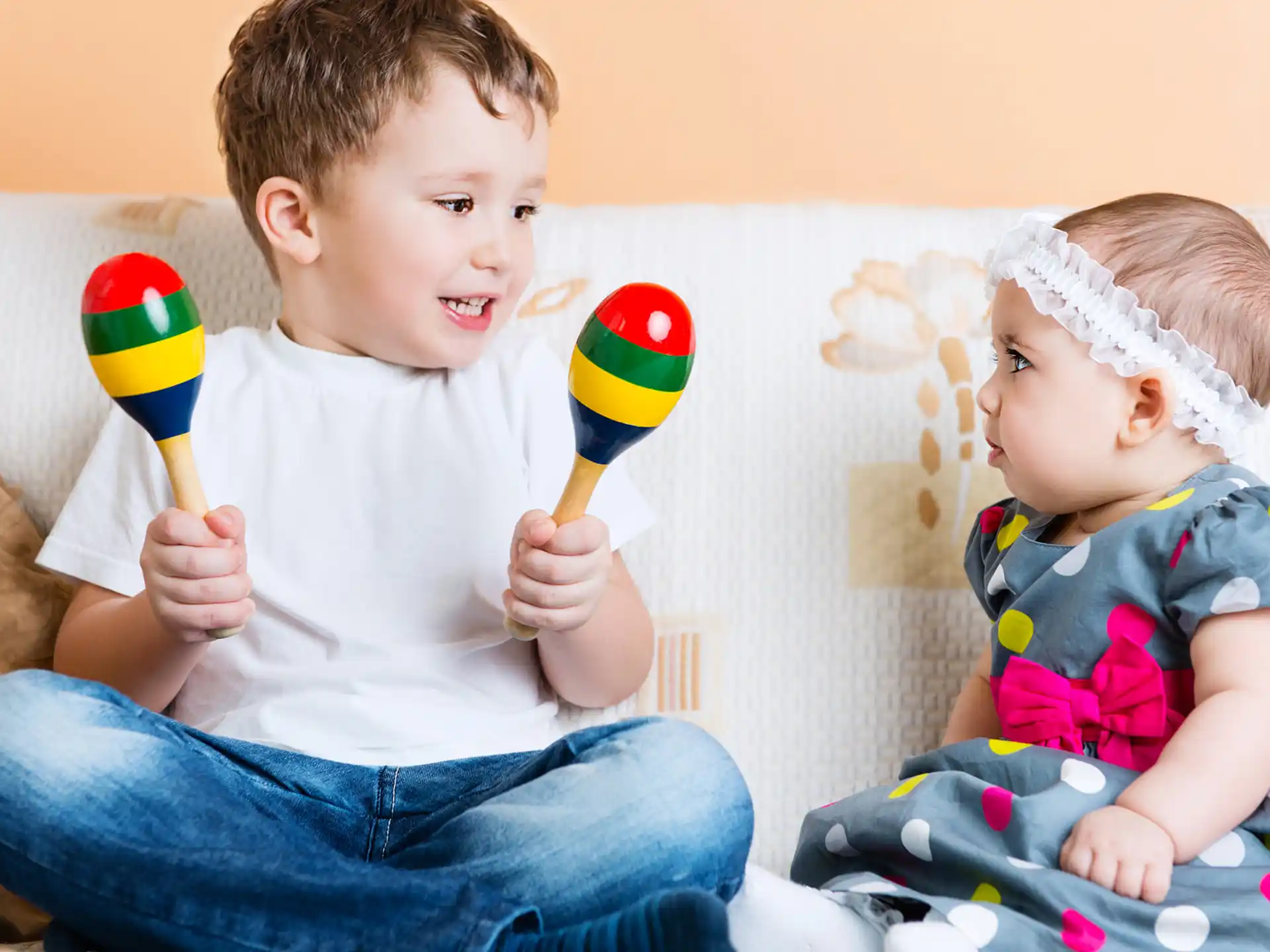 a couple of kids playing with toys
